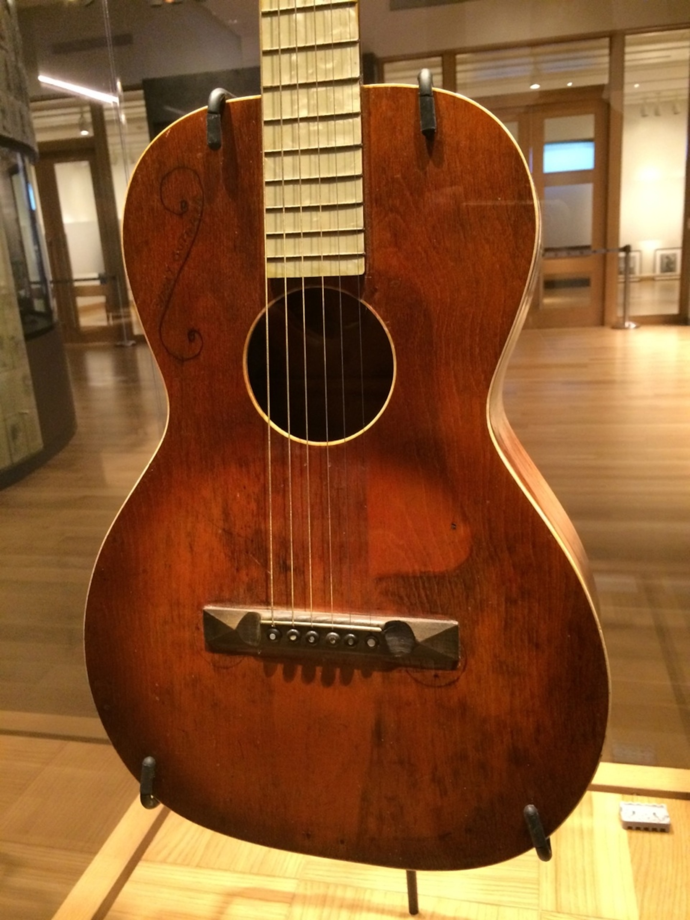 A rare display, one of Woody Guthrie's original guitars at the Woody Guthrie Center in Tulsa, Oklahoma. (Photo by Andrew Evans, National Geographic Travel)