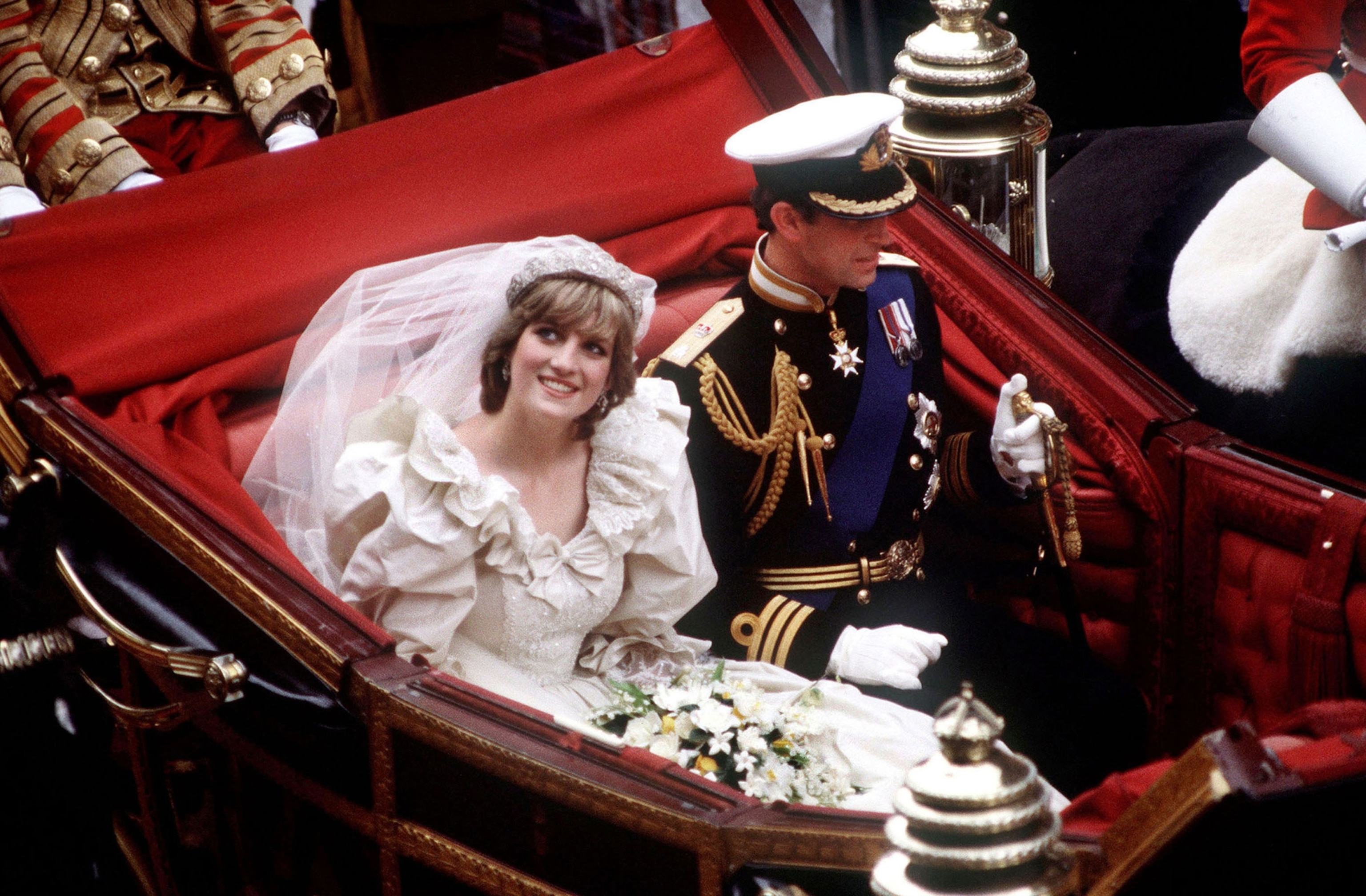 the Prince and Princess of Wales returning to Buckingham Palace by carriage