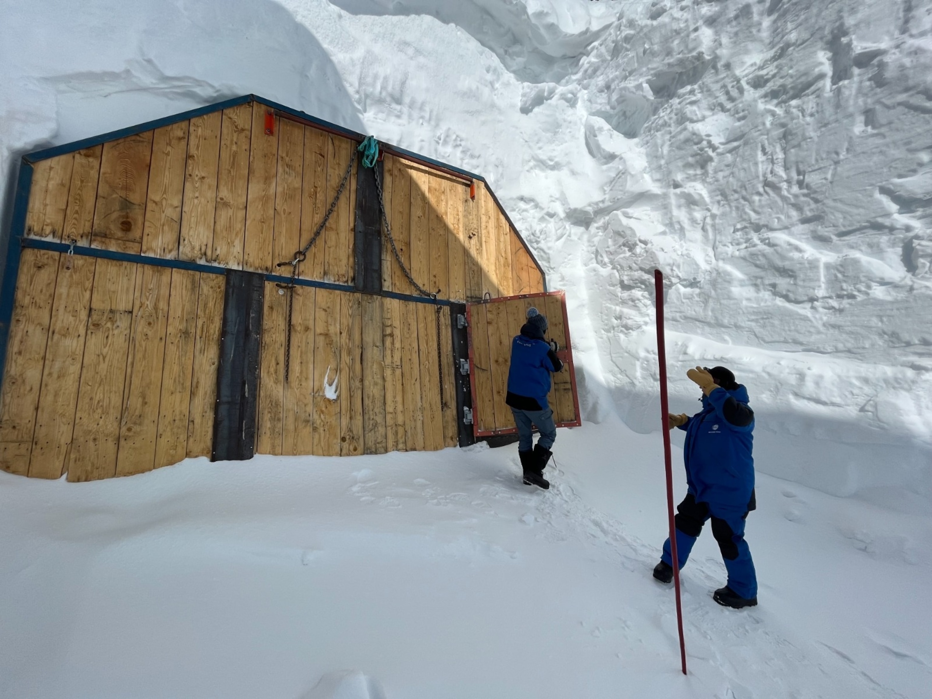 Entrance to ice cave, with wooden door