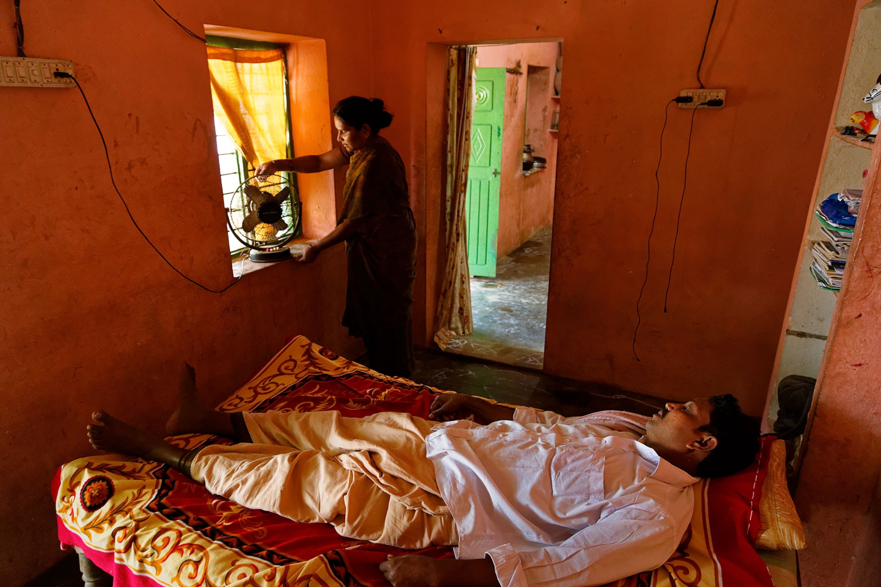a man lying in his bed