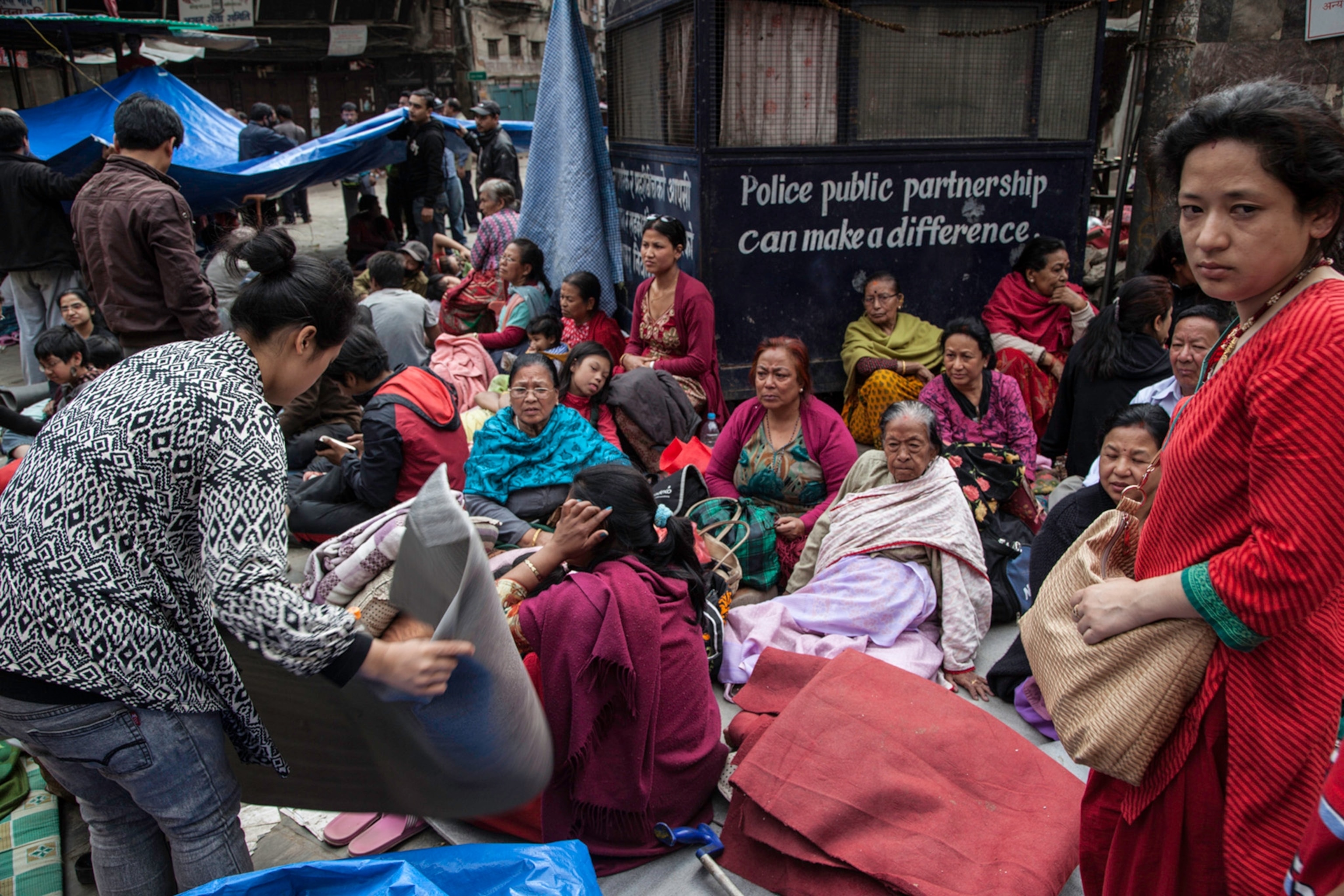 urban dwellers camping outside in Ason Tole, Bazaar in Katmandu, Nepal