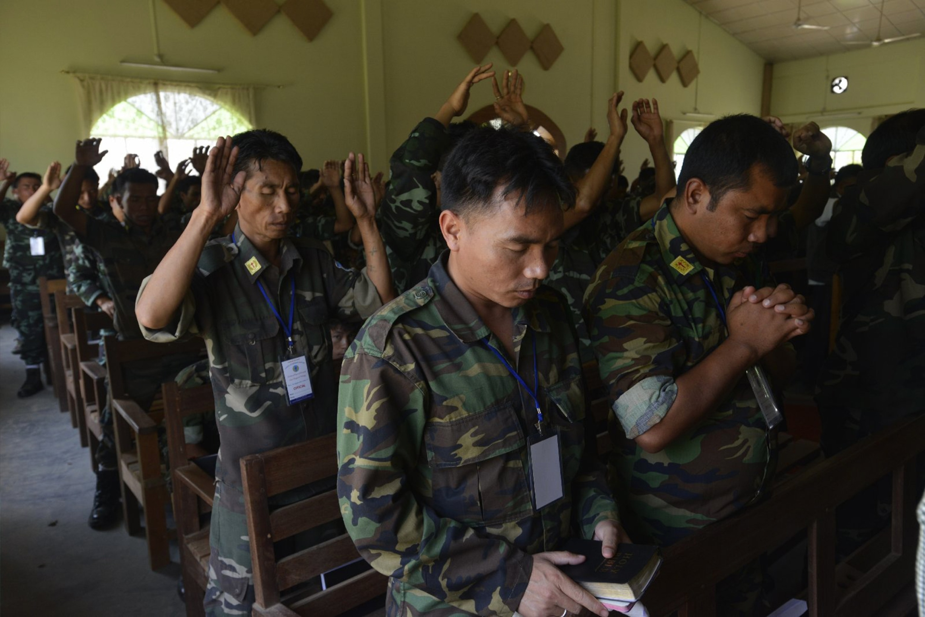 soldiers praying in church