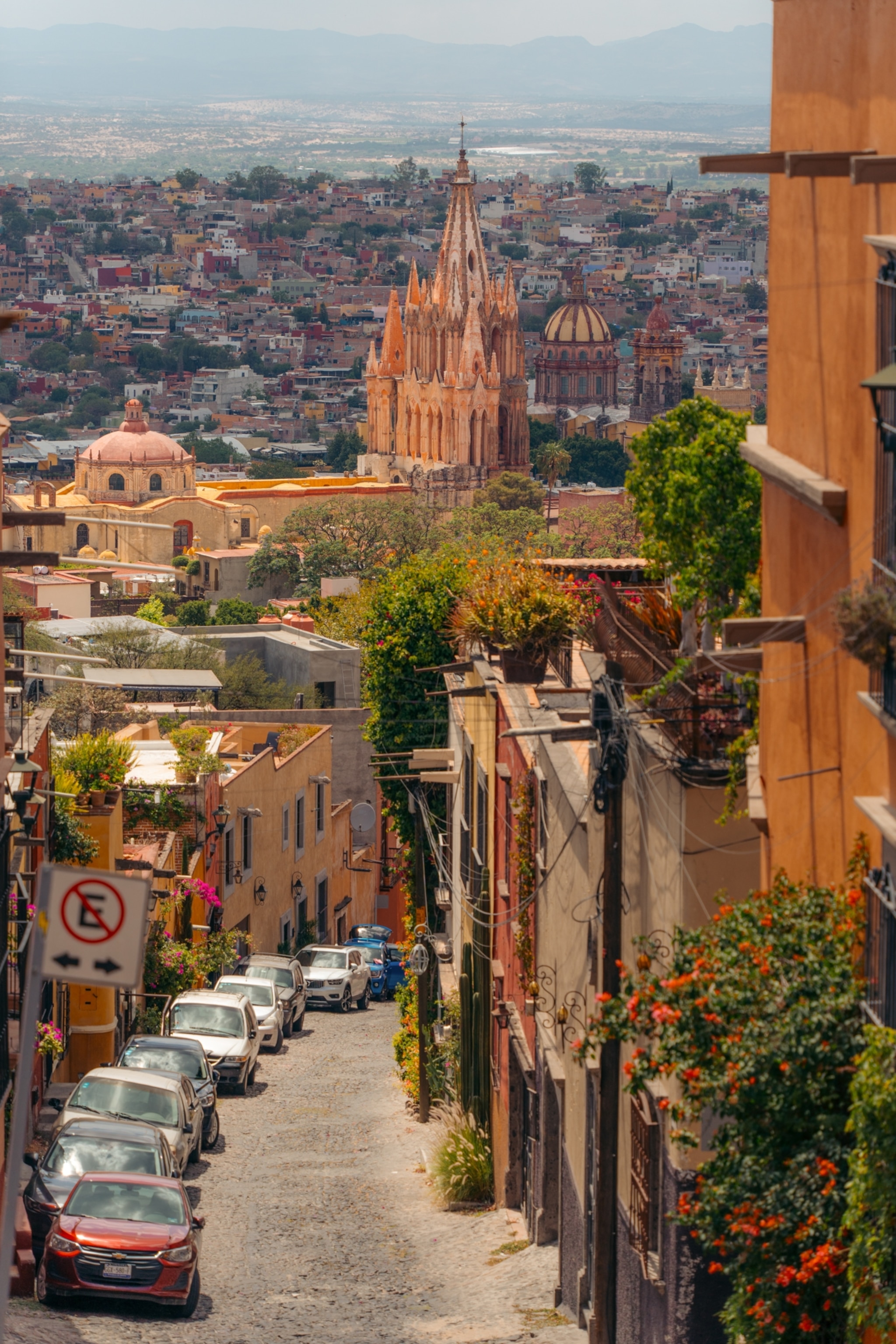 Cobblestone street overlooks the San Miguel Arcángel city center
