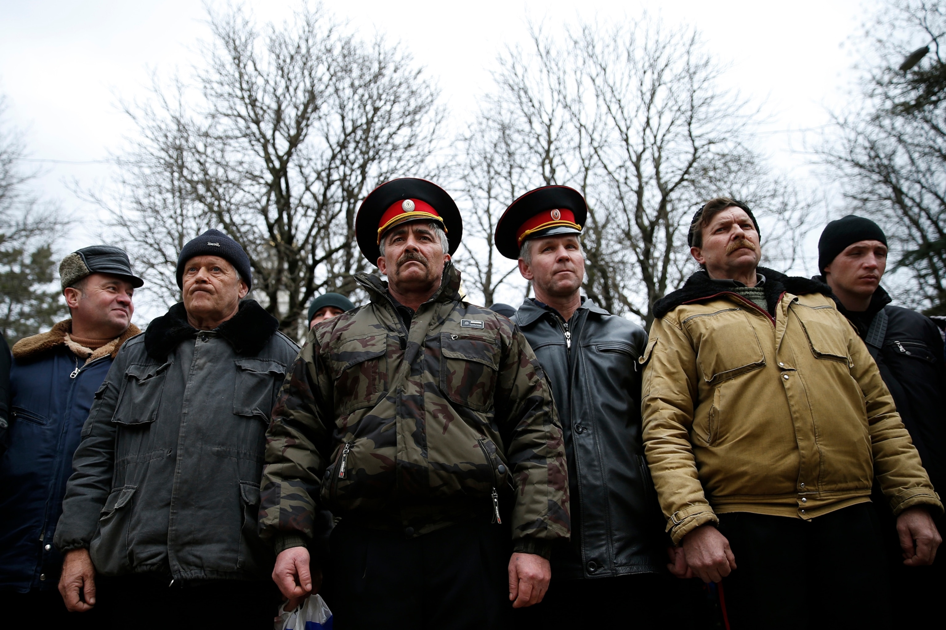 Unidentified armed men patrol outside of Simferopol airport, on February 28, 2014.