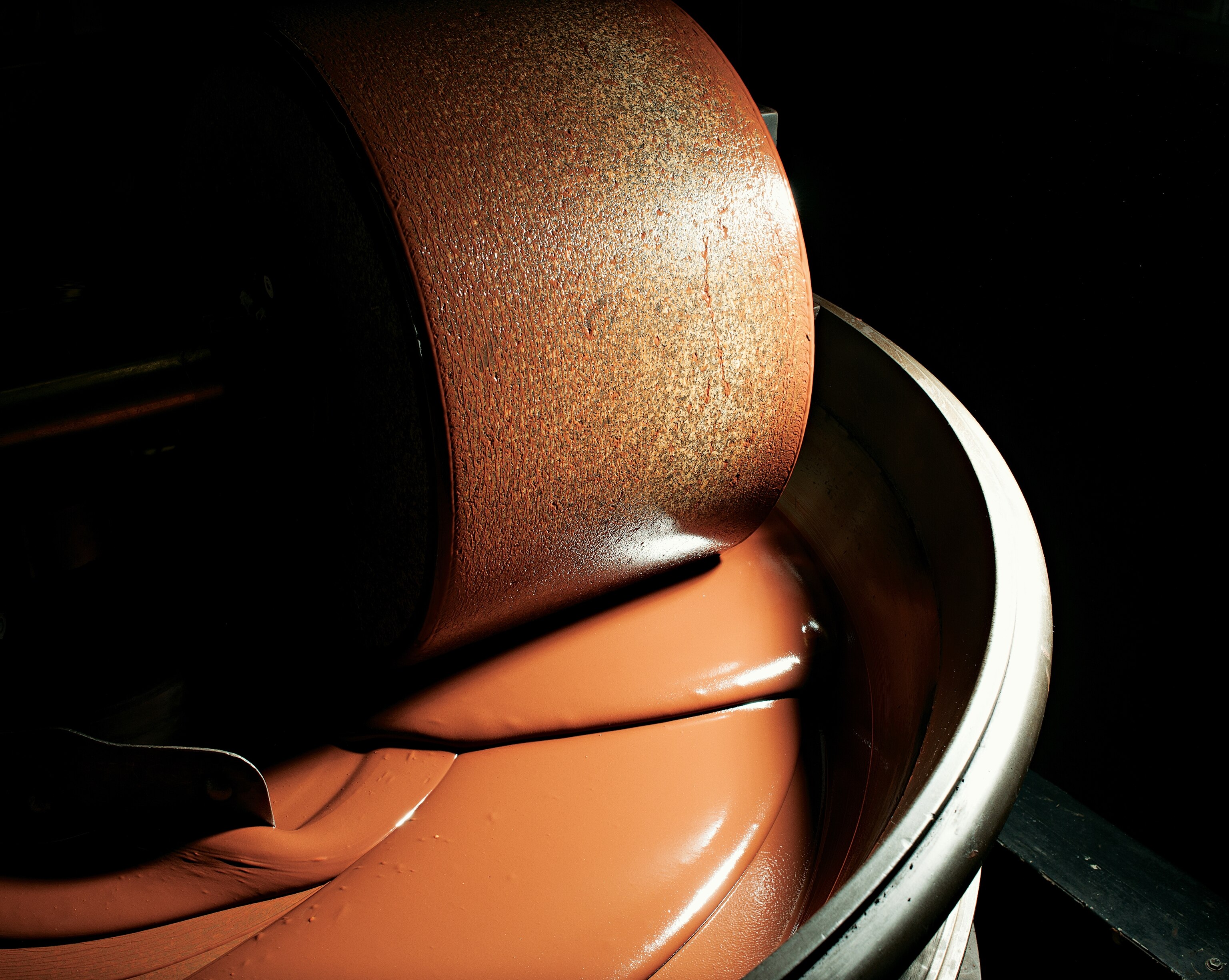 cocoa paste mixing with other ingredients at the chocolatier Cazenave in Bayonne, France