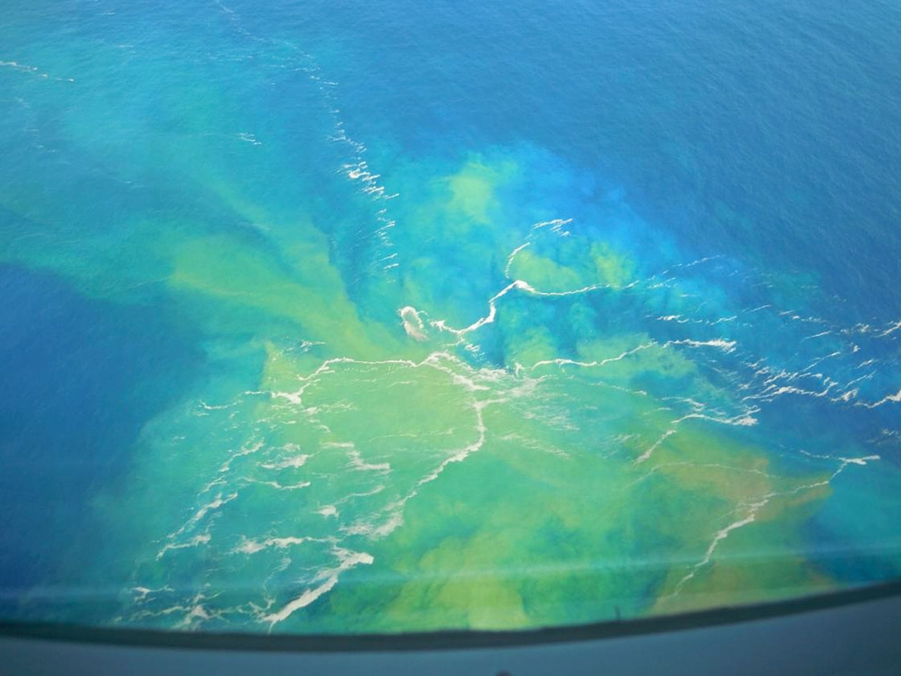 discolored water from undersea volcano eruption off Japan