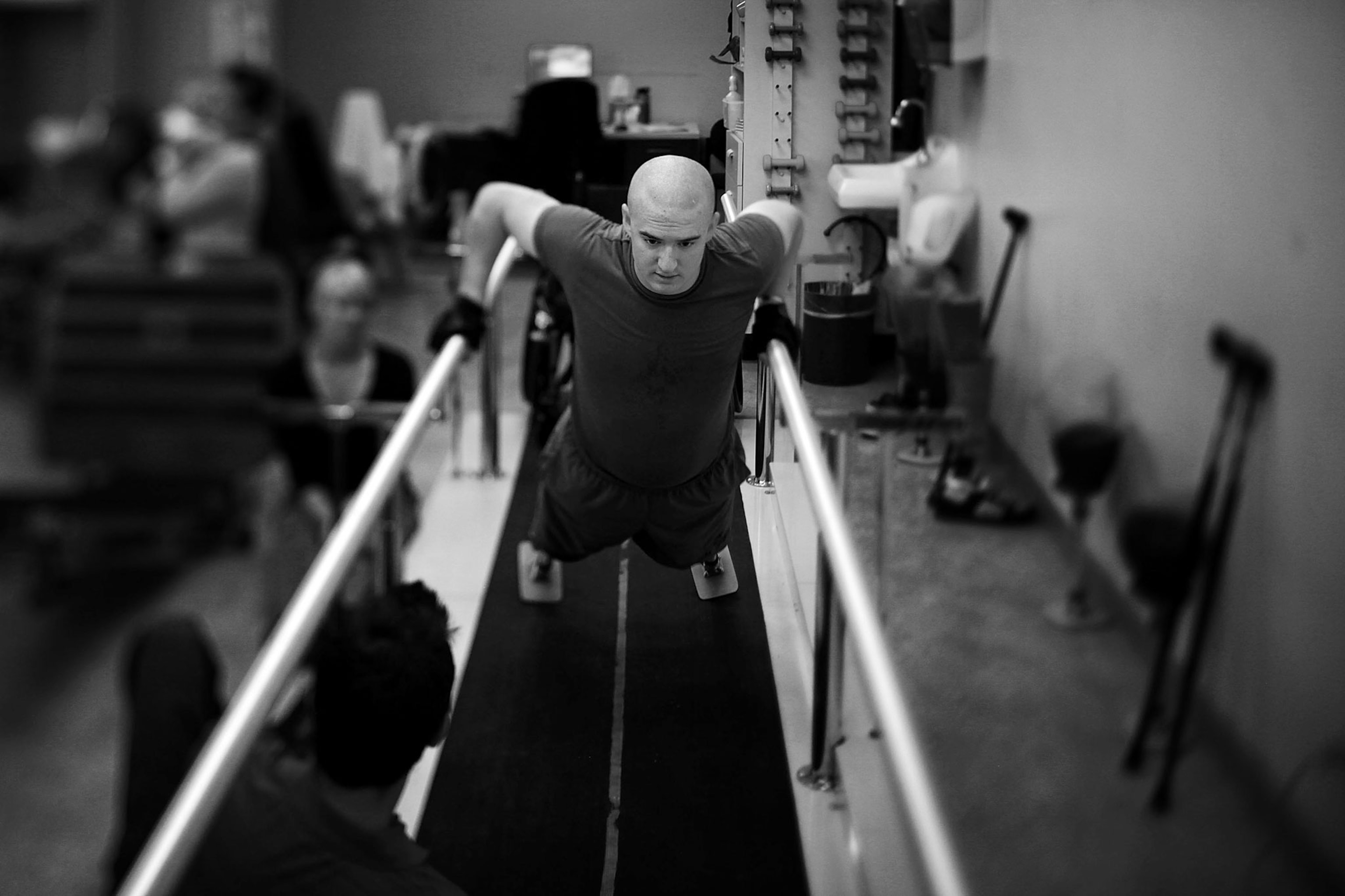 Lance Cpl. Jake Romo does physical therapy at the Naval Medical Center in San Diego