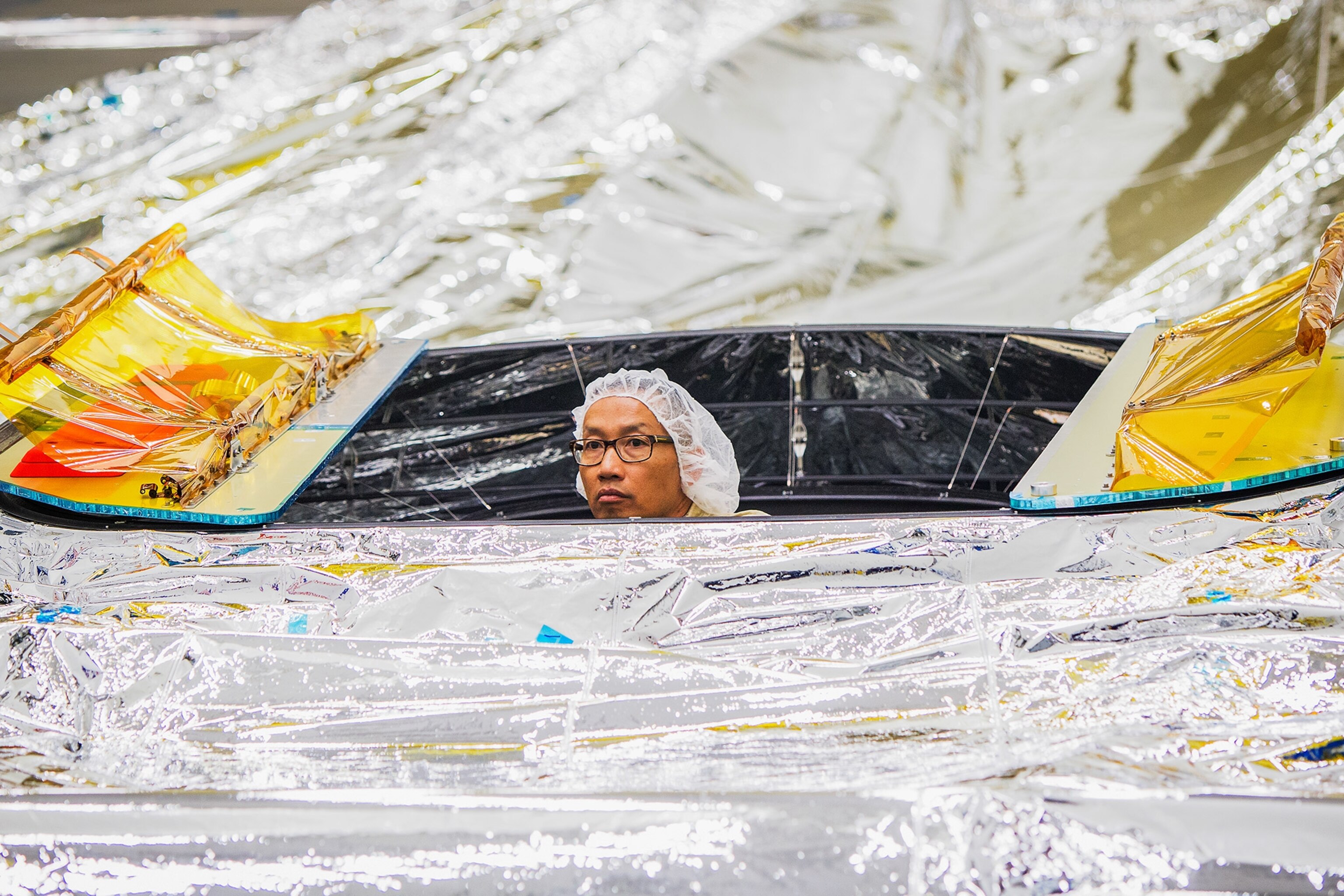 an engineer working on the James Webb telescope
