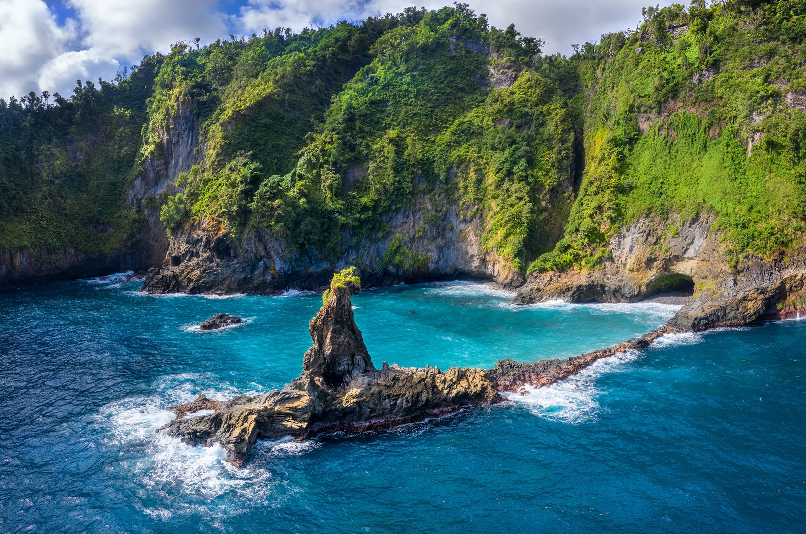 Glassy Point, East Coast of Dominica, West Indies. A picturesque area popular with visitors. December 2019. Drone photo. Stitched panorama.