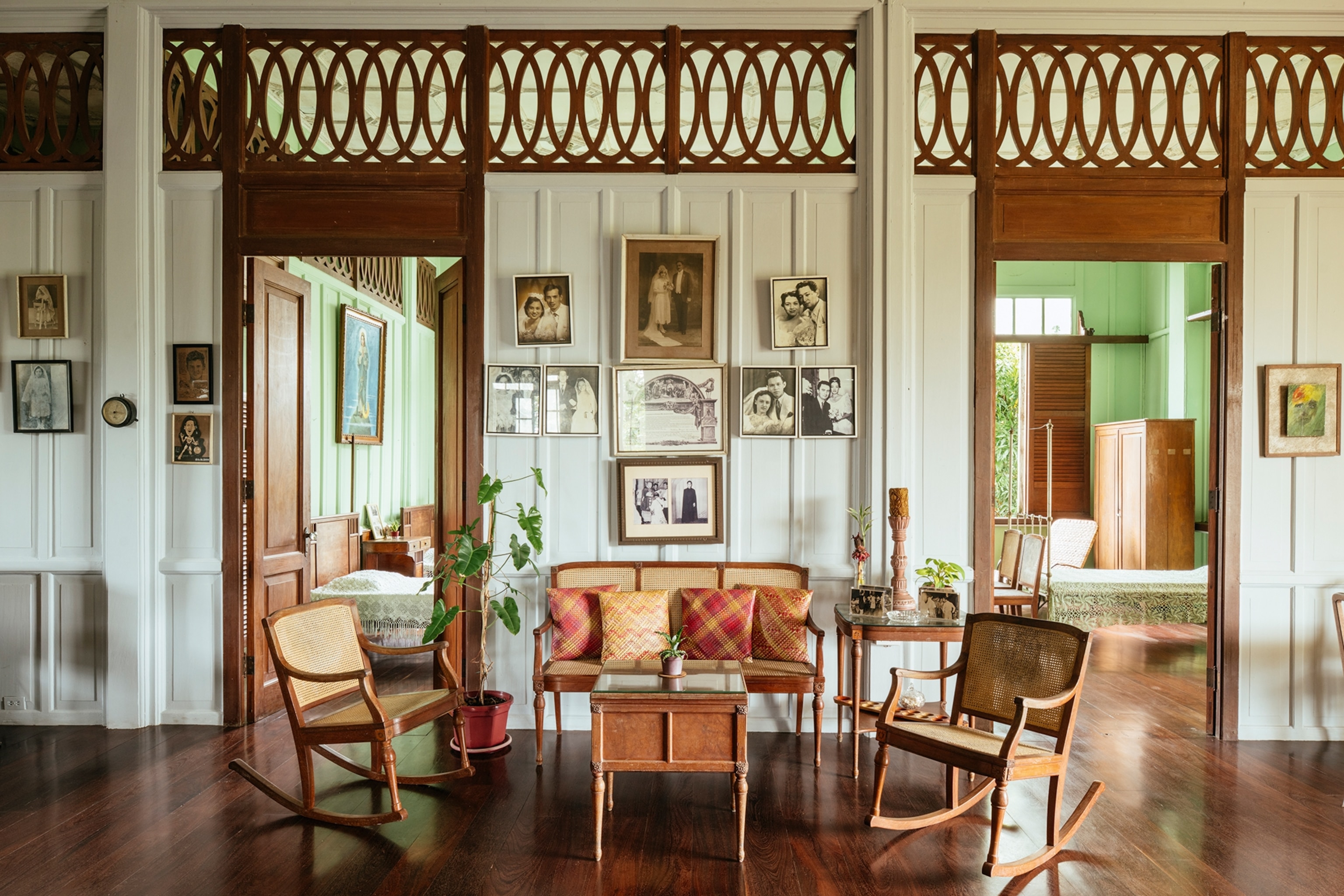 The interiors of a mansion with bamboo furniture.