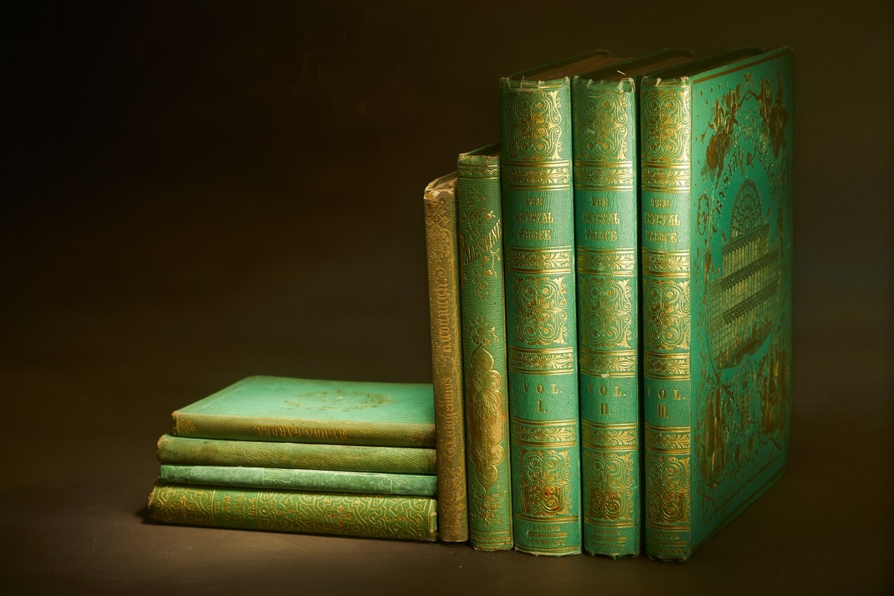 still life of green books stacked