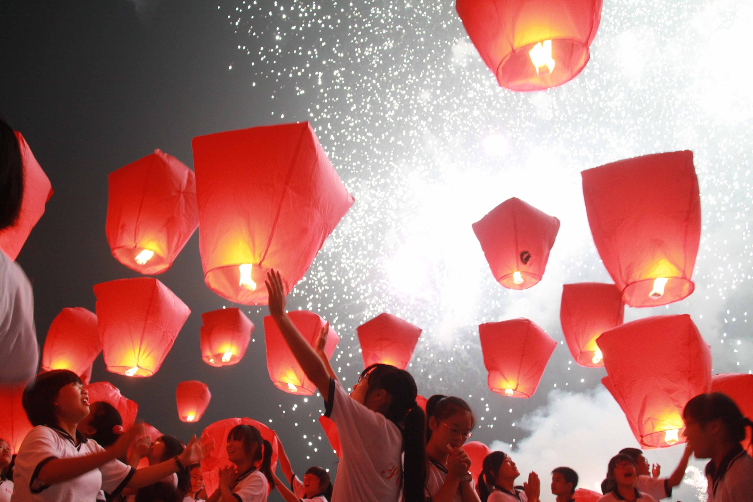 lamps being lit to celebrate the mid-autumn festival in Yinchun, China