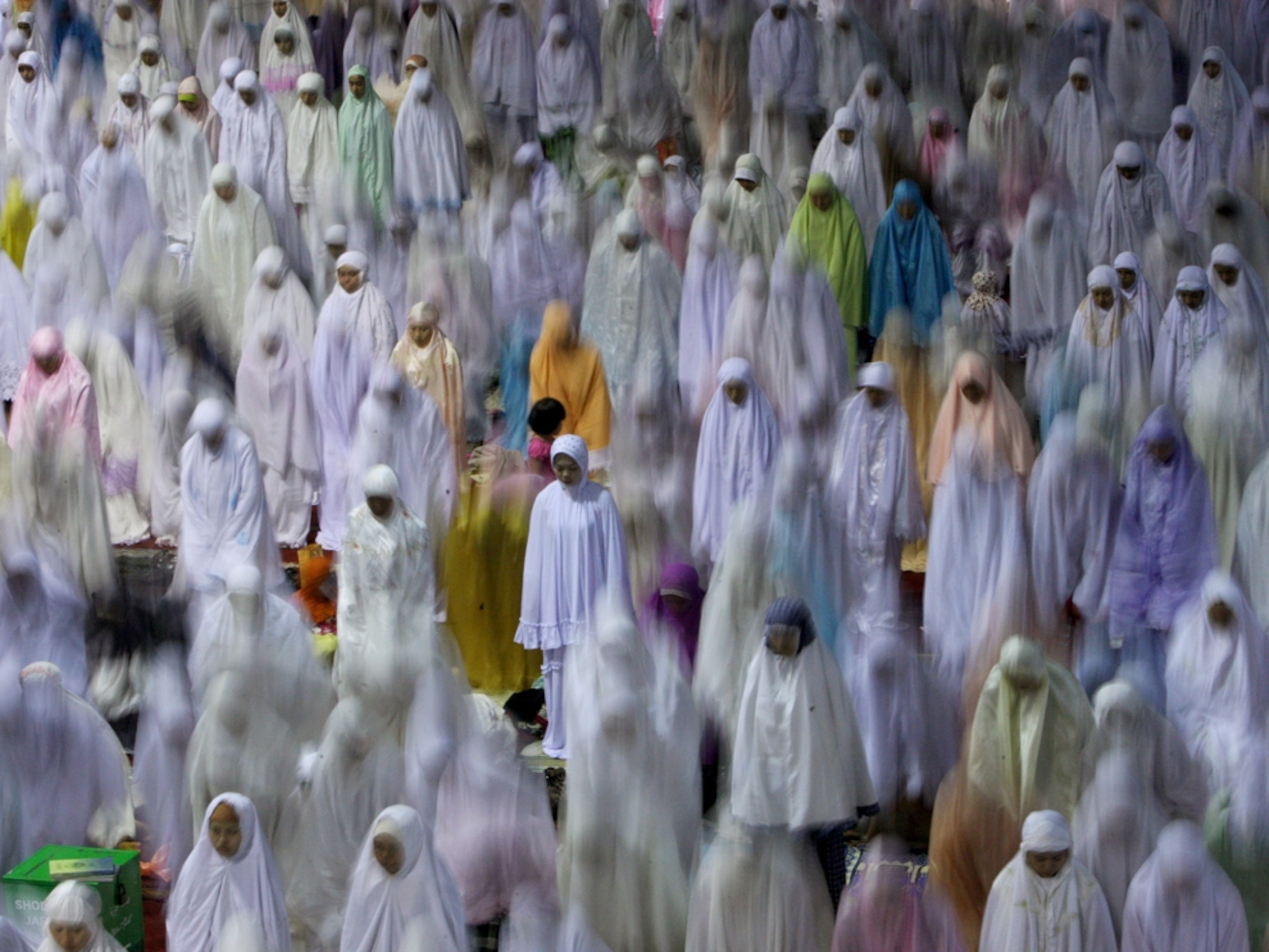 Large group of people praying
