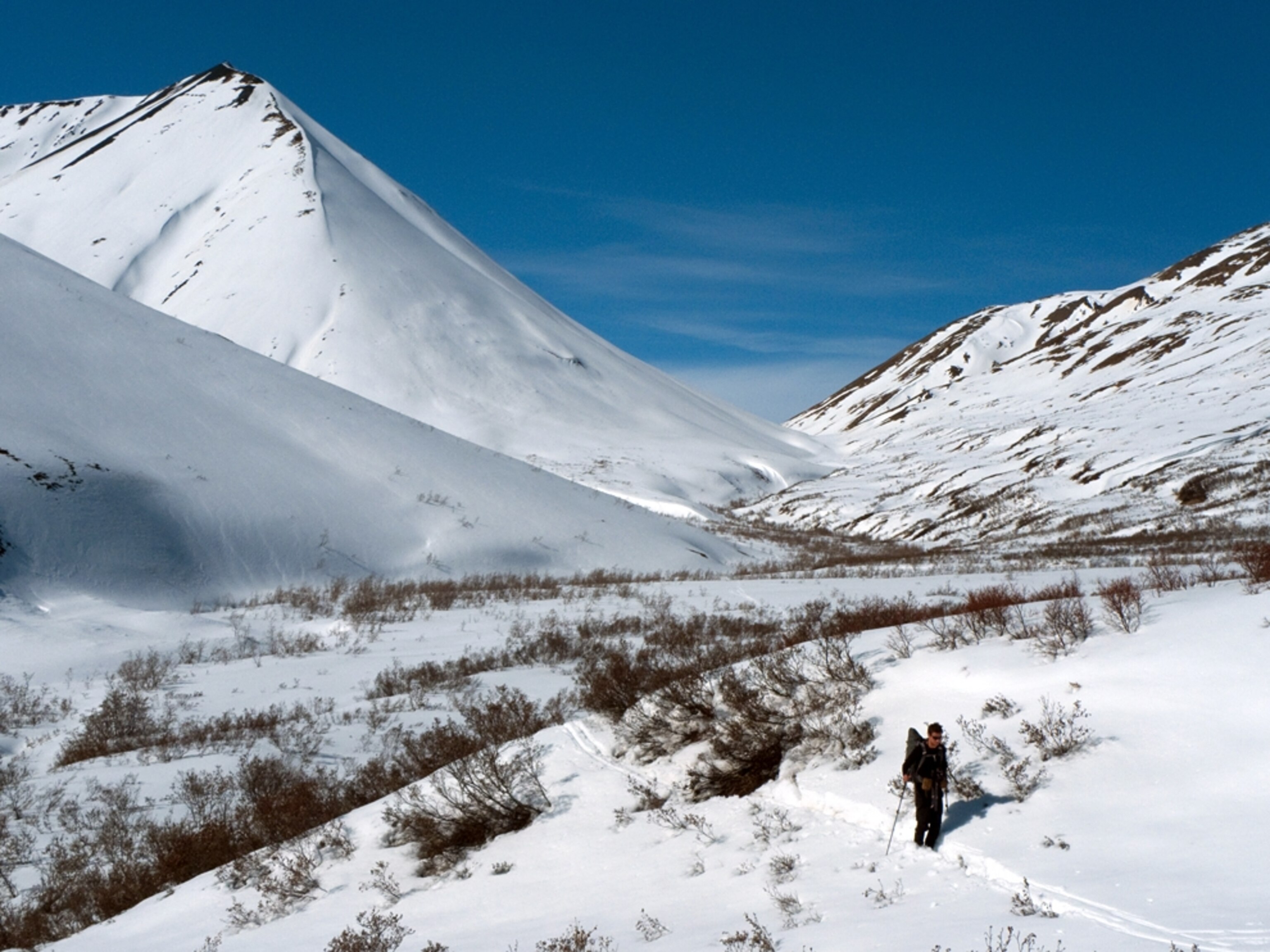 Hiker by a mountain