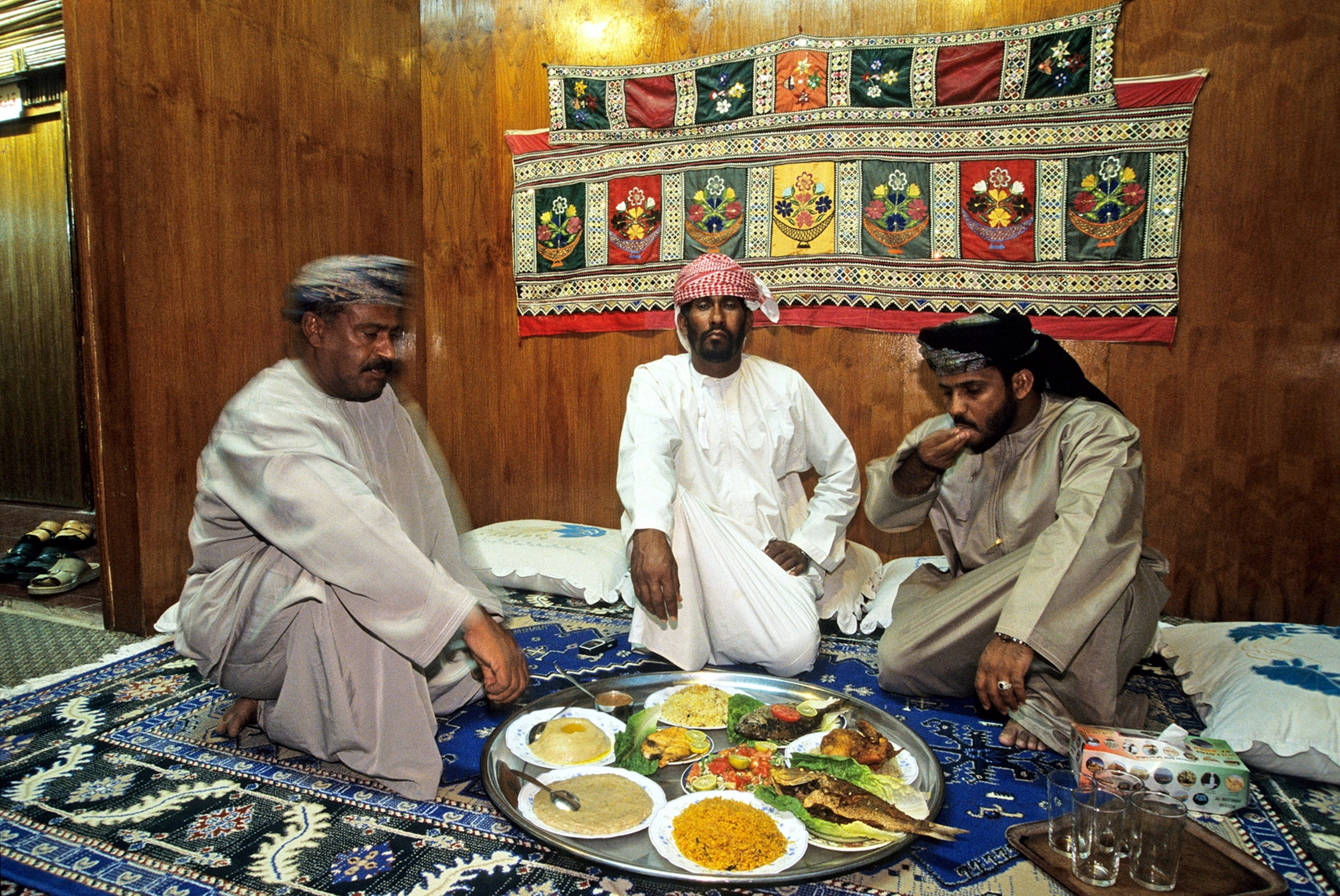 Bedouins in traditional restaurant in Dhofar, Oman