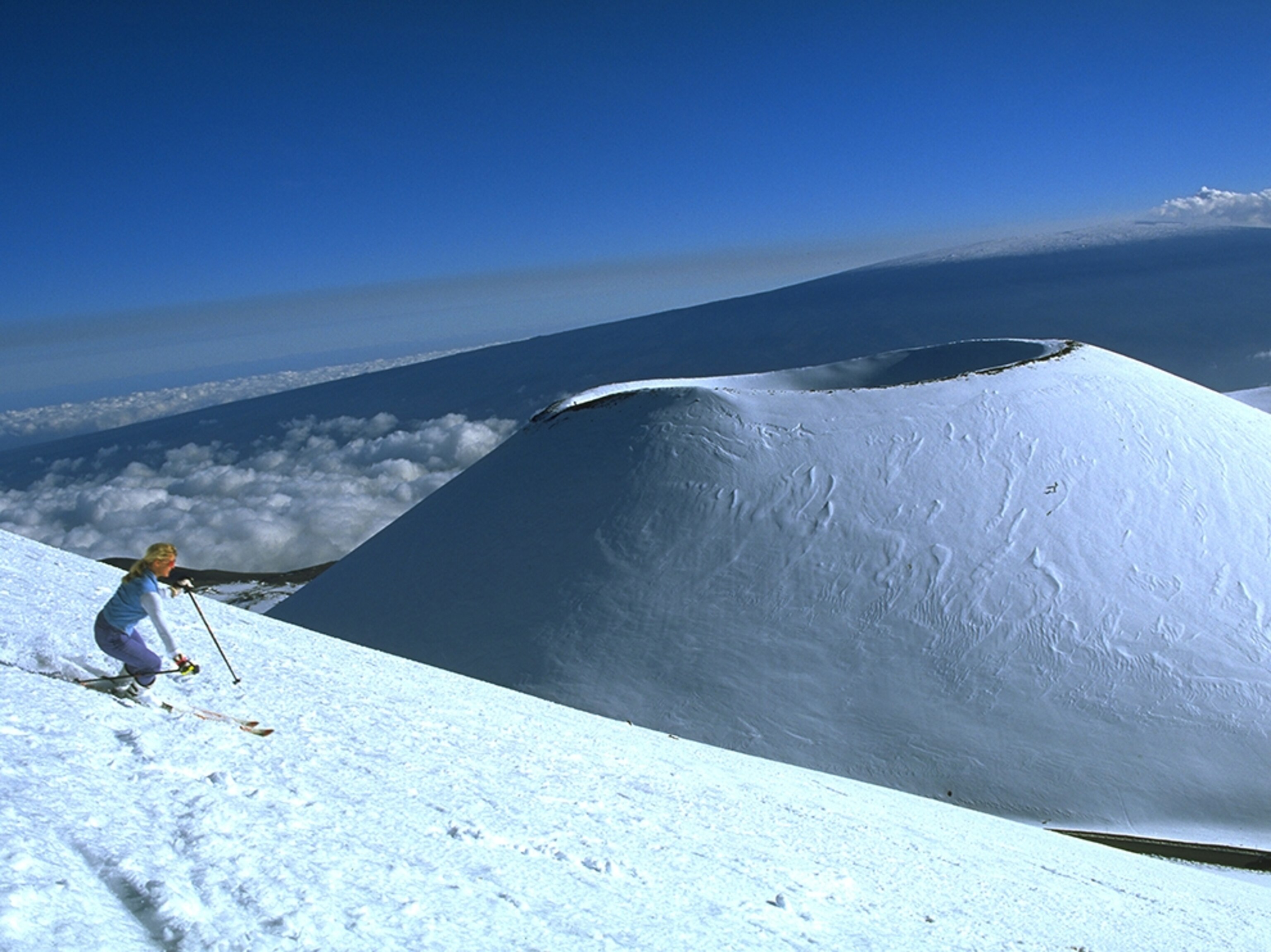 a woman skiing on Mauna Kea Island of Hawaii