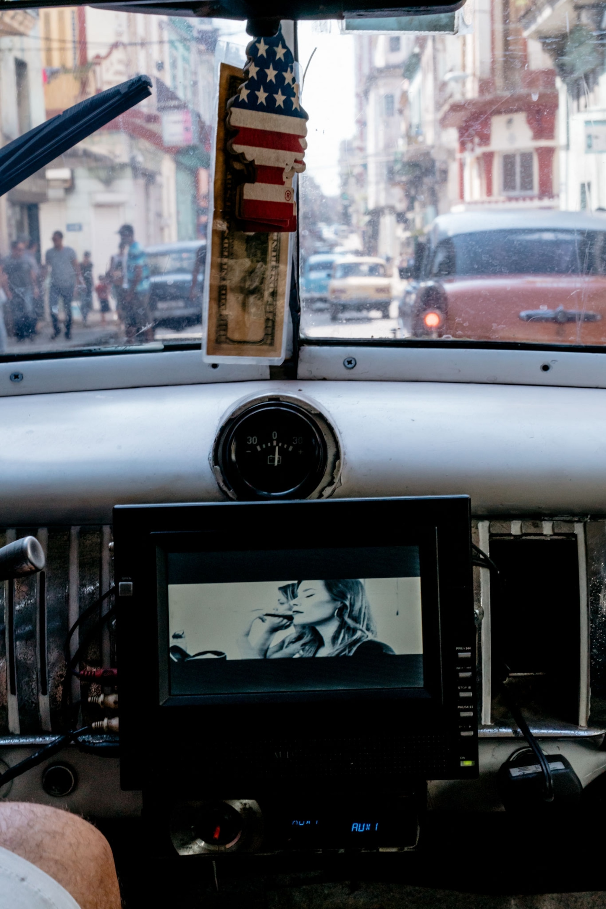 a person driving a taxi in Havana, Cuba