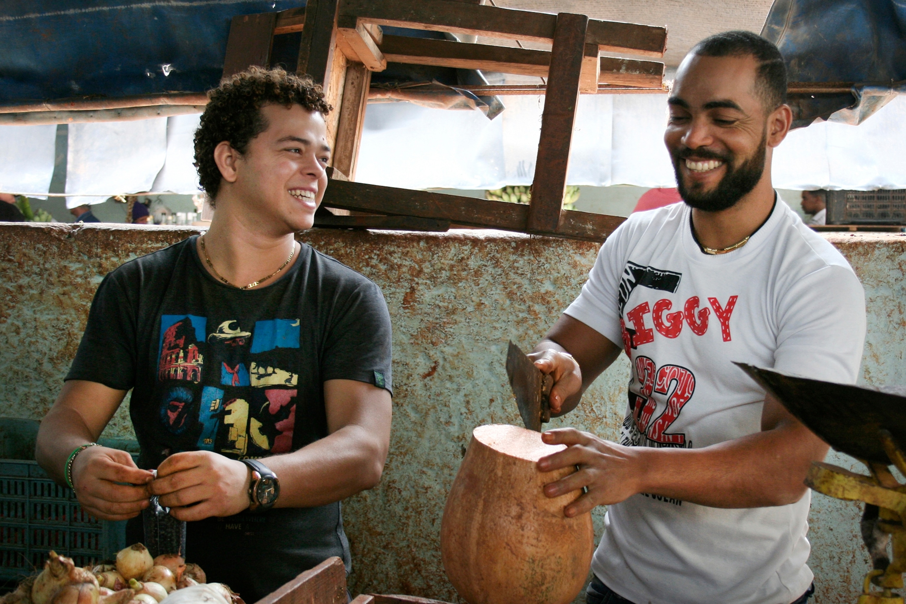 men working in a market in Havana, Cuba