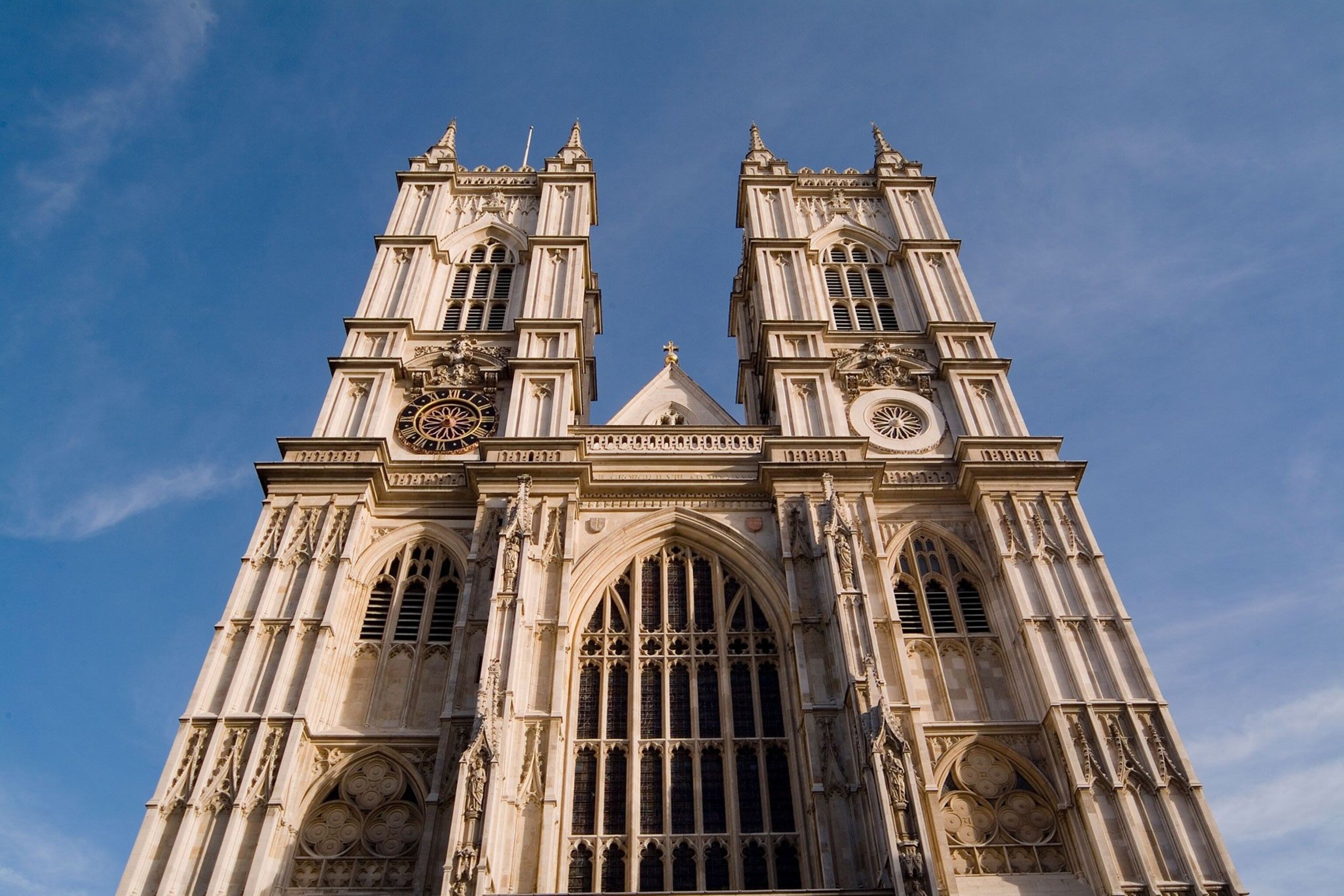 Looking up at the front of Westminster Abbey.