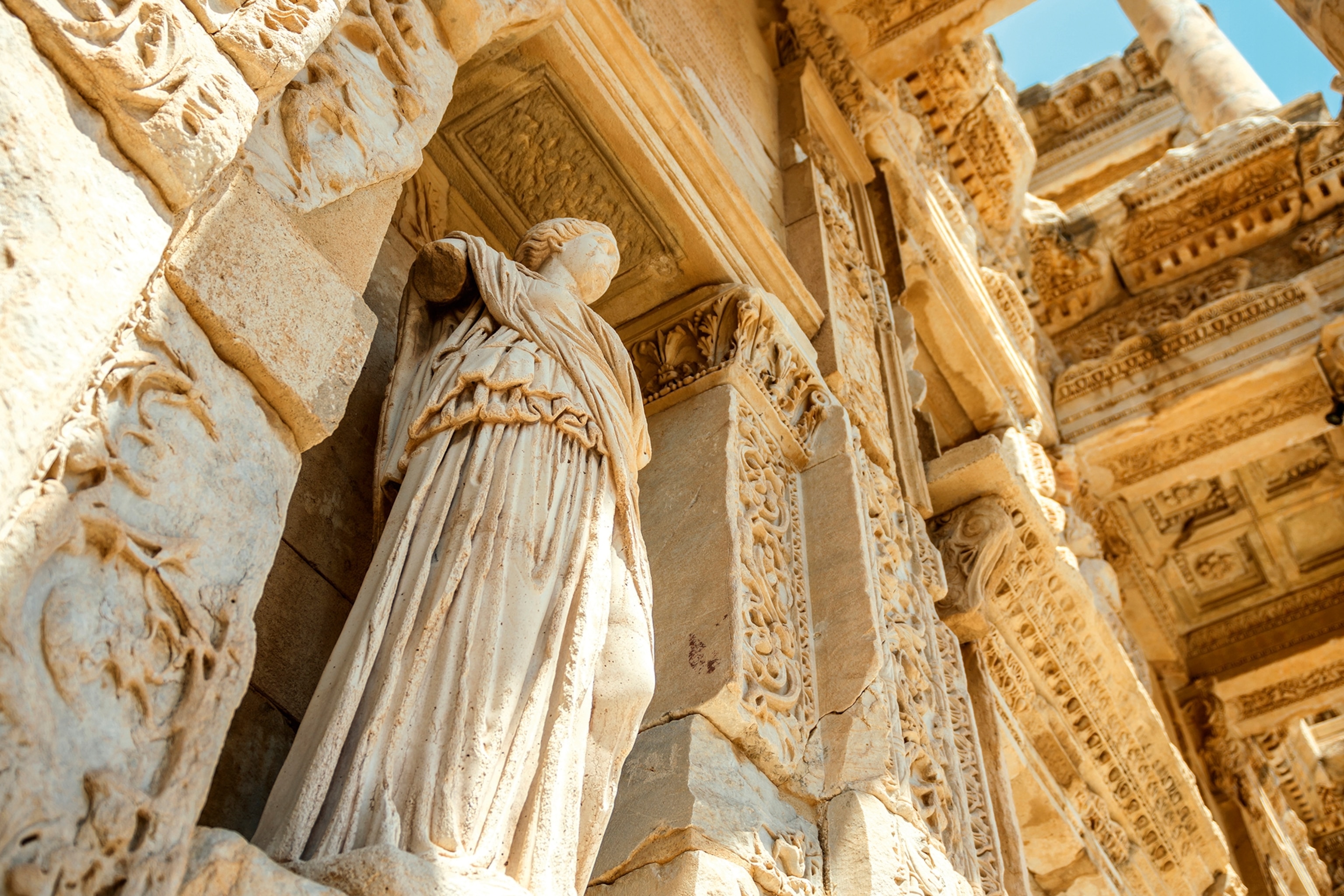 Statue outside ancient library.
