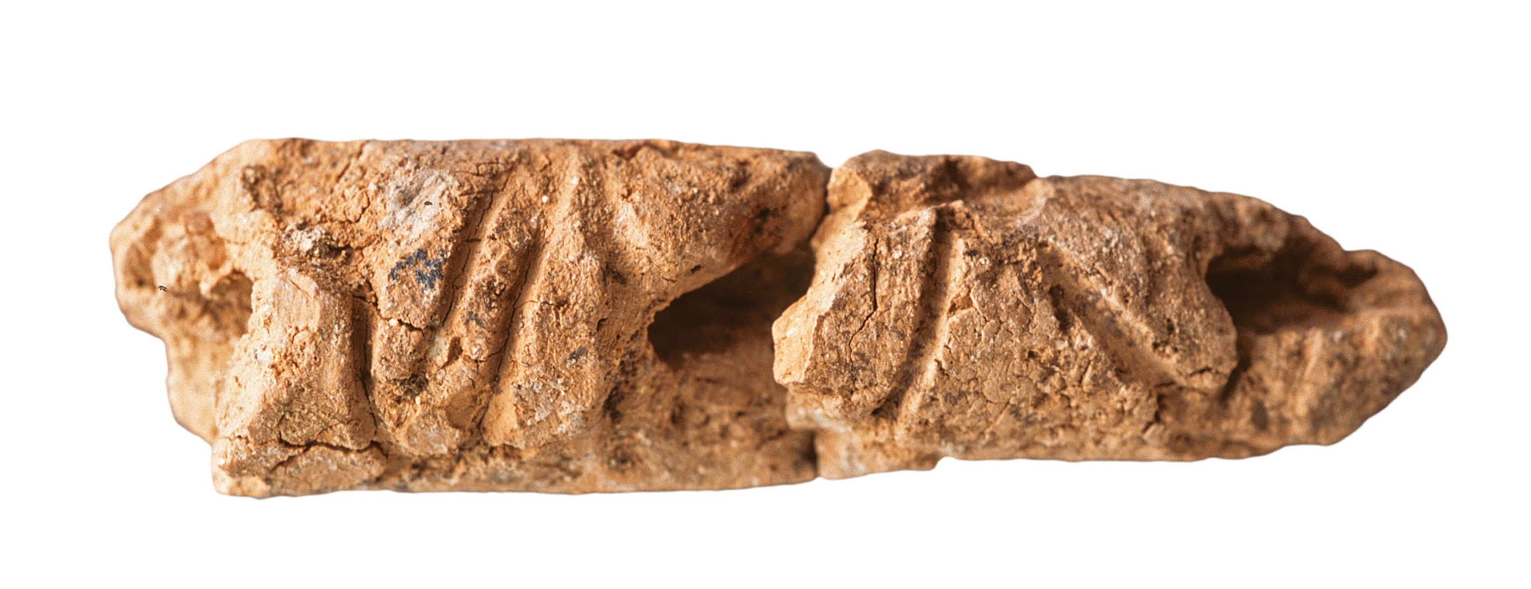 Clay cylinder from Umm el-Marra, Syria.