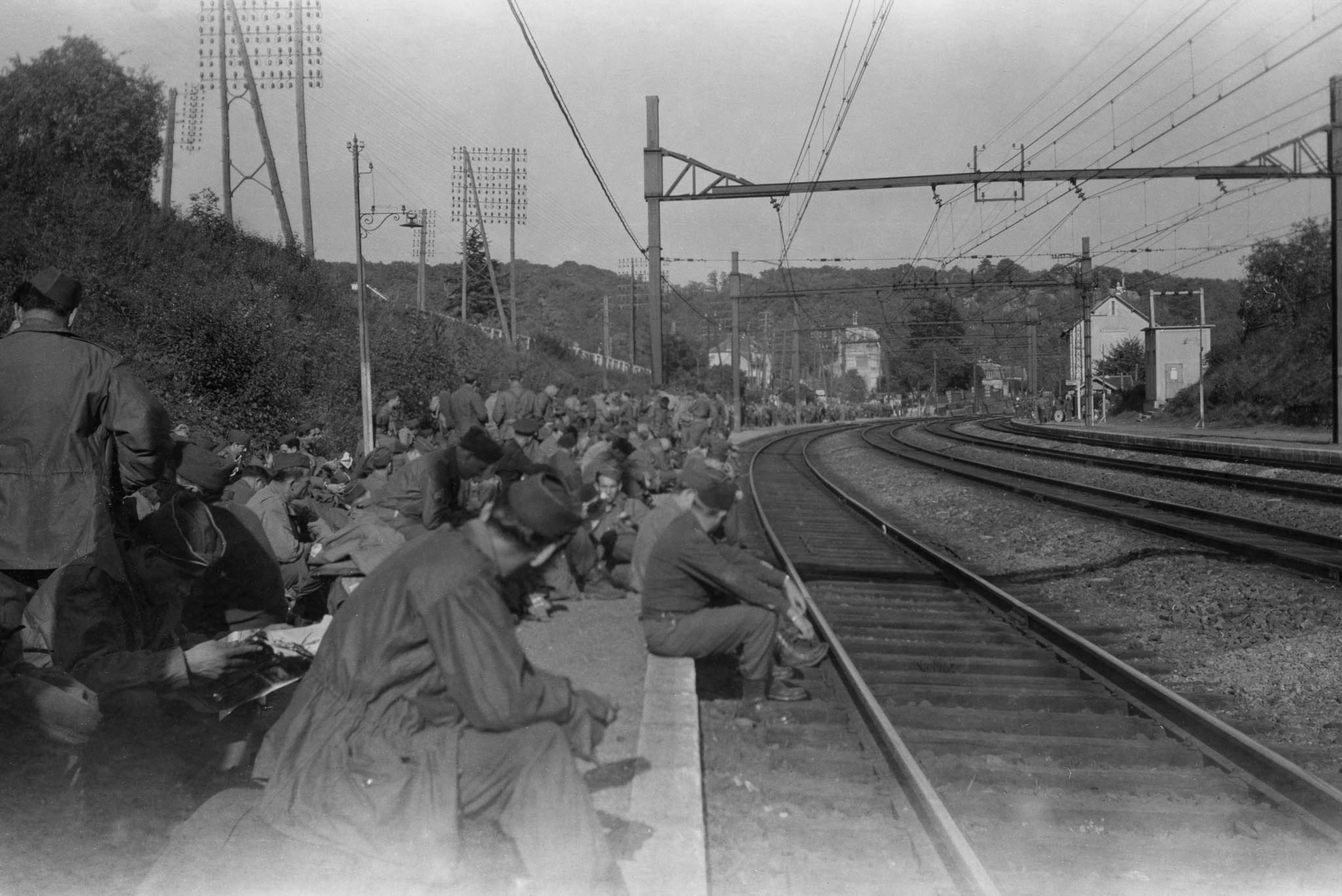 soldiers waiting for train