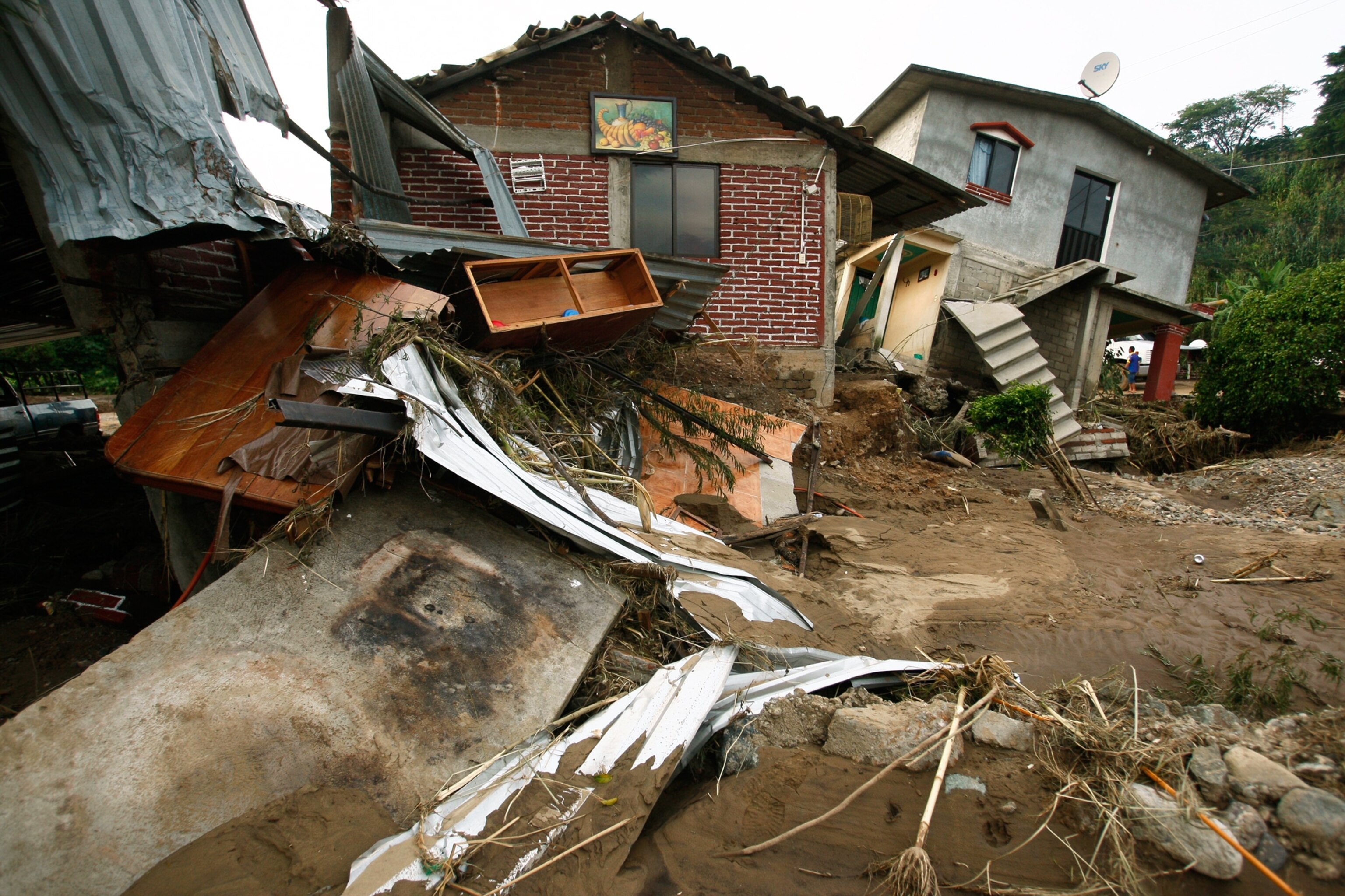 homes damaged by heavy rains in the state of Oaxaca, Mexico
