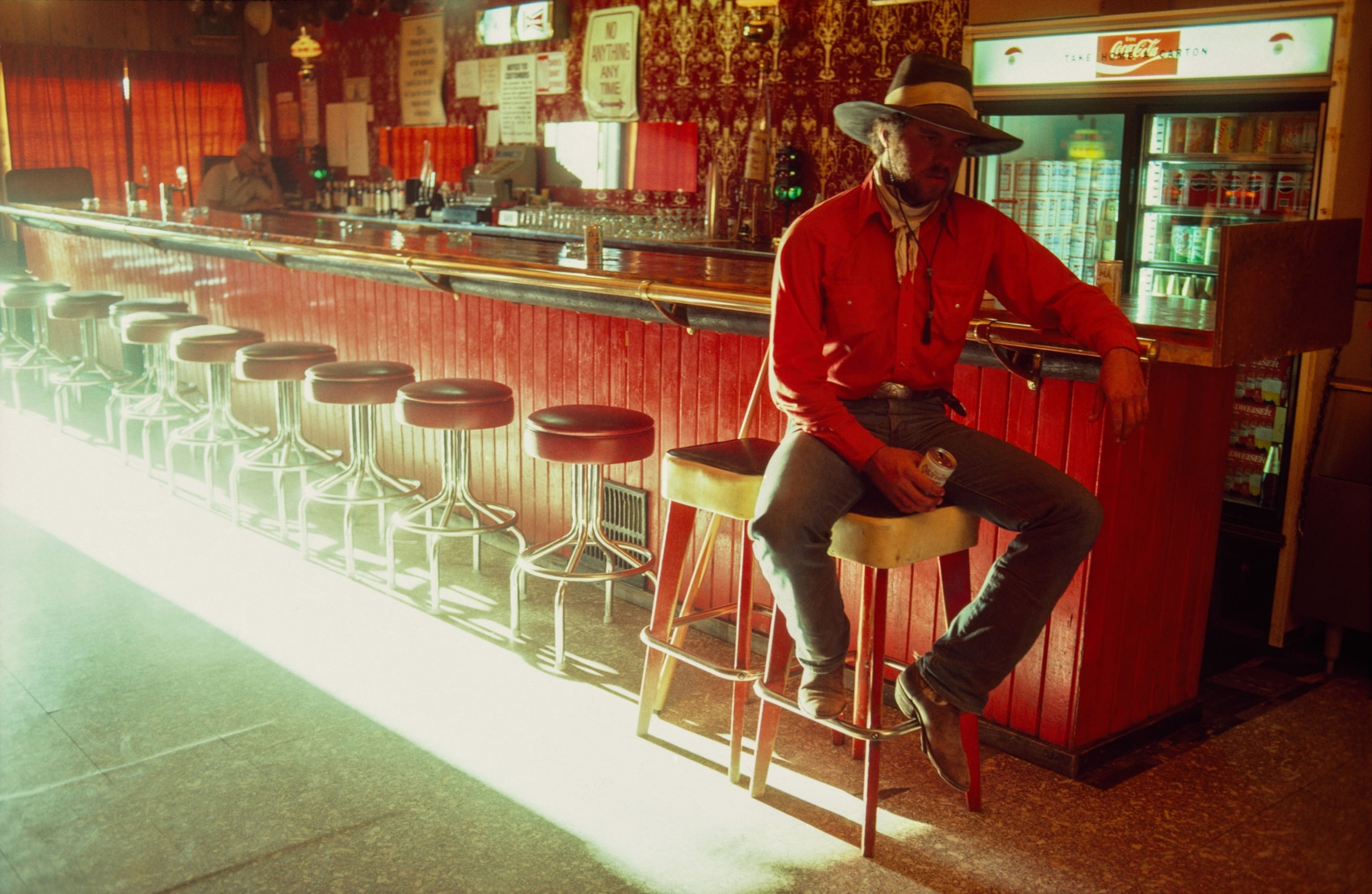 a cowboy in a bar
