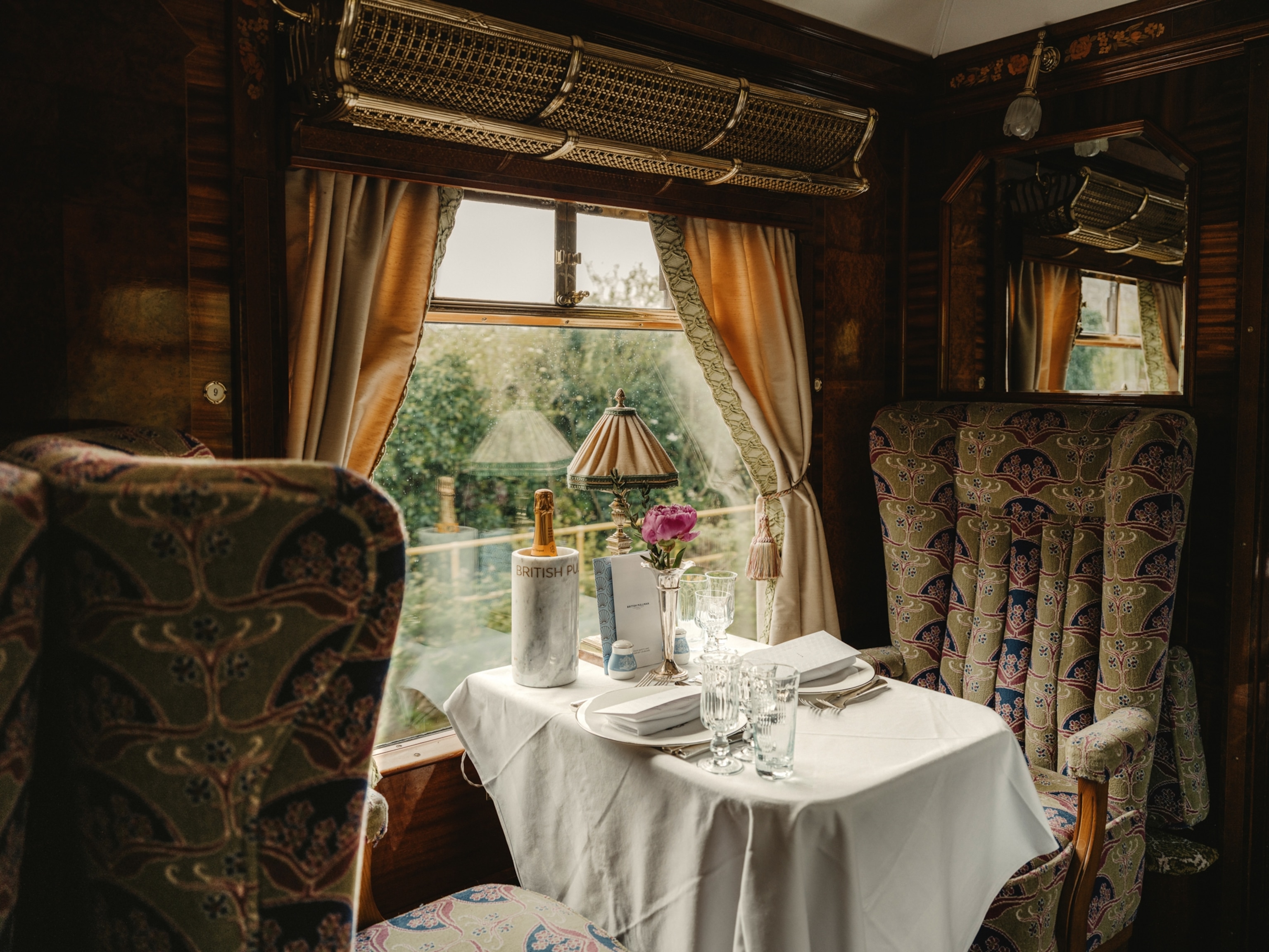 Inside the dining car of the British Pullman, a Belmond train.