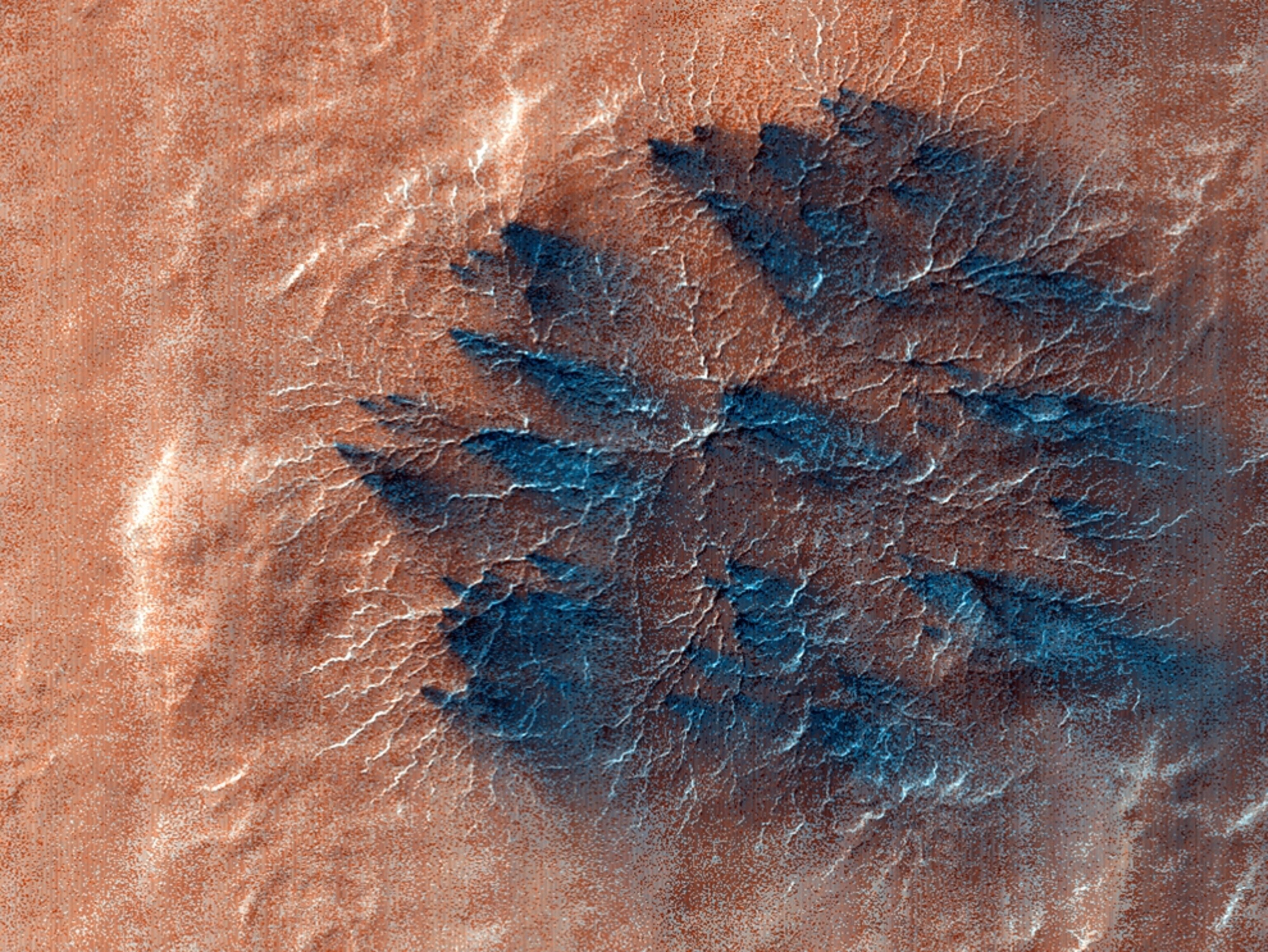 False-color picture of fans of particulates on Mars.