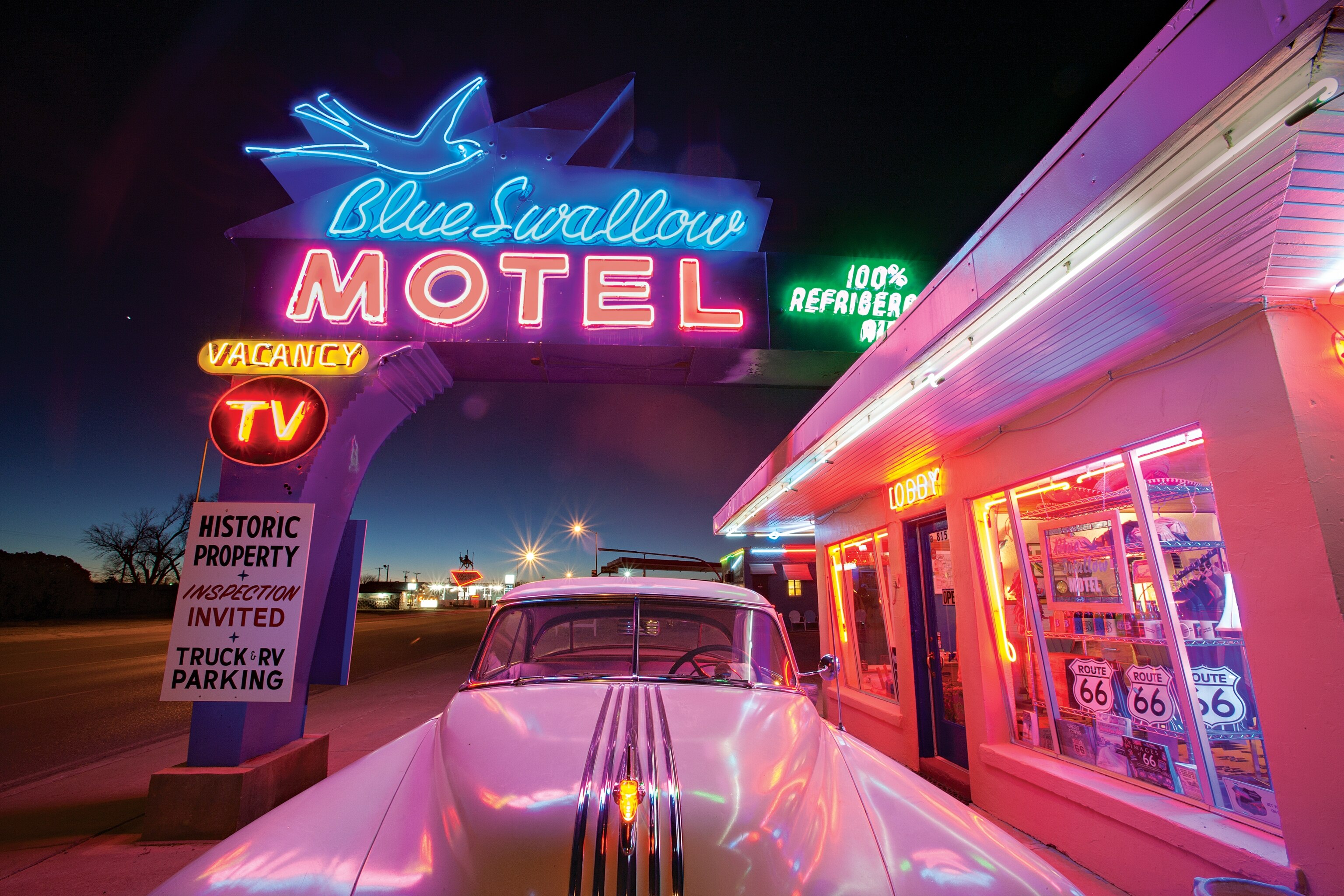 a historic car parked at the Blue Swallow Motel in Tucumcari, New Mexico