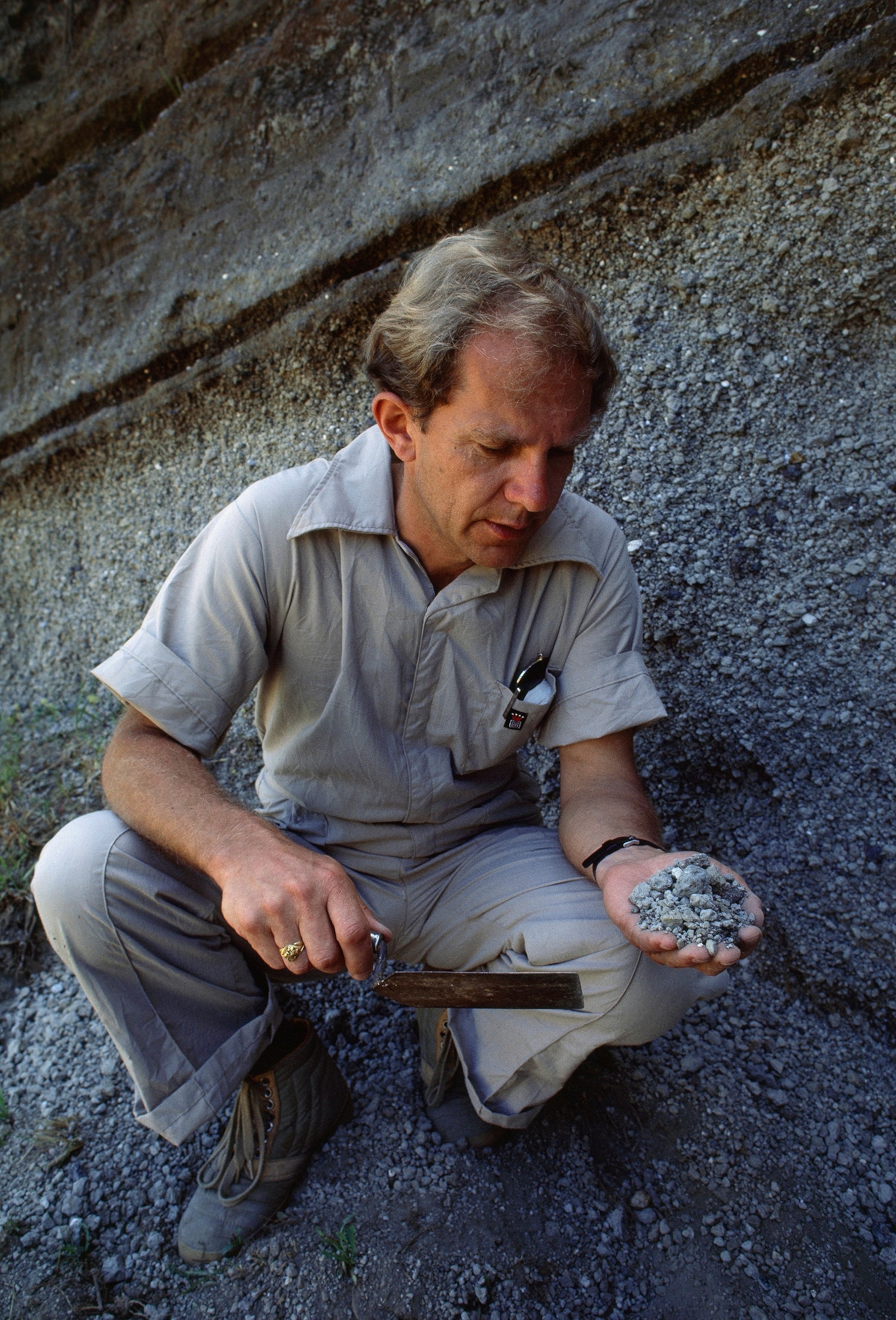 Researcher examines volcanic ash from Mount Vesuvius' ancient eruption.