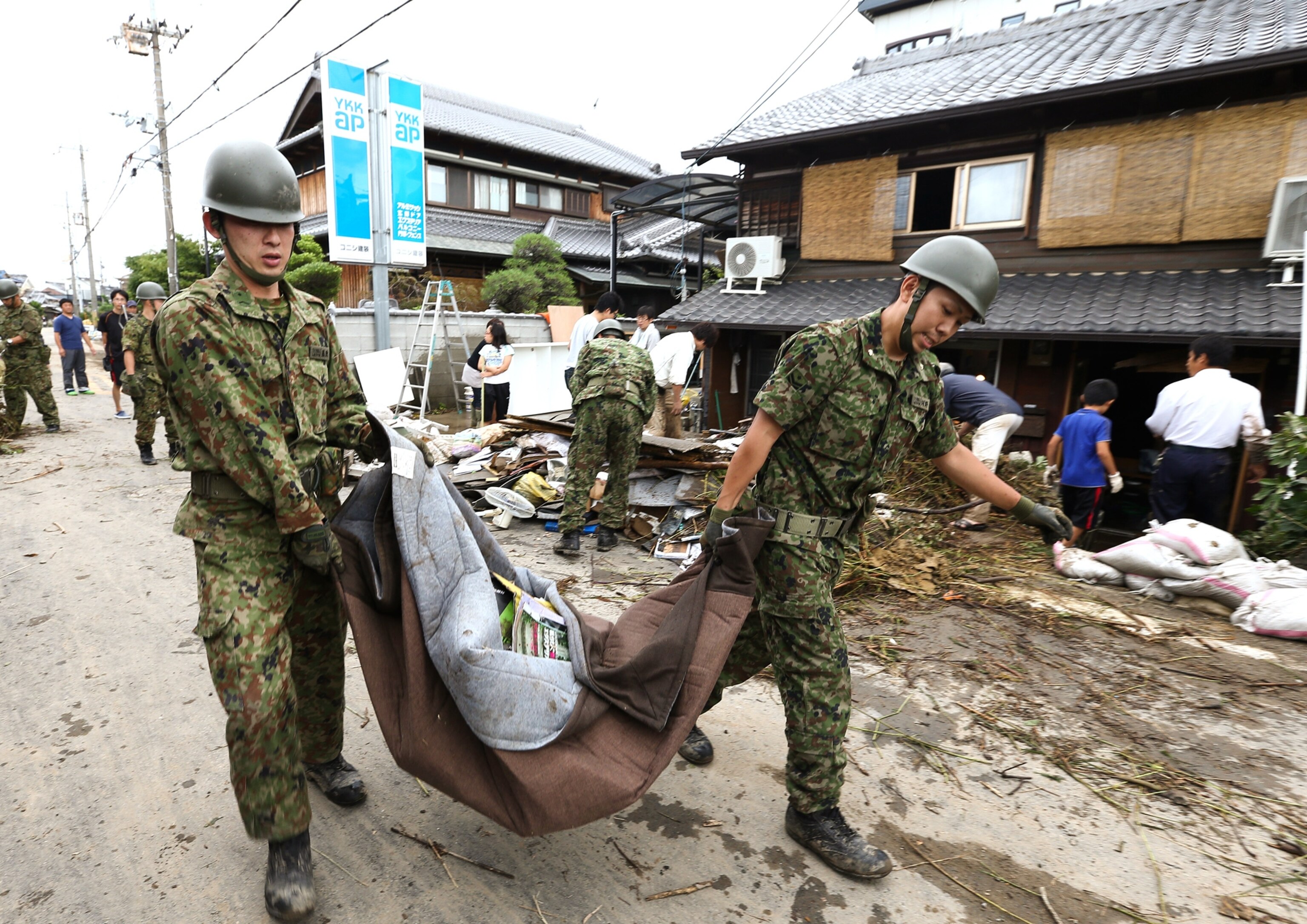 removing wreckage from Kyoto typhoon