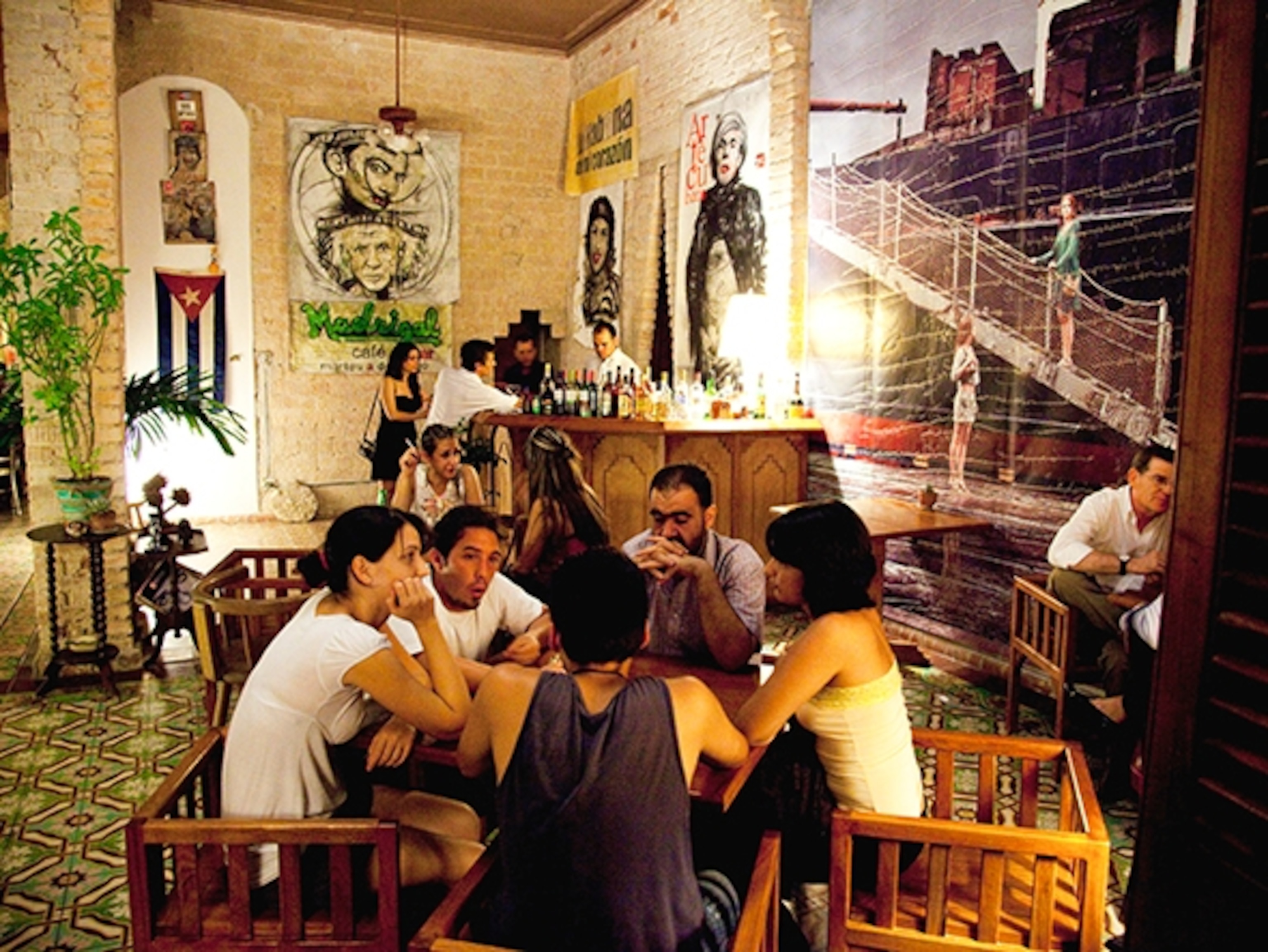 Located in the home of filmmaker Rafael Rosales, Madrigal is one of Havana's burgeoning privately owned restaurants. (Photograph by Jose Goitia, The New York Times/Redux