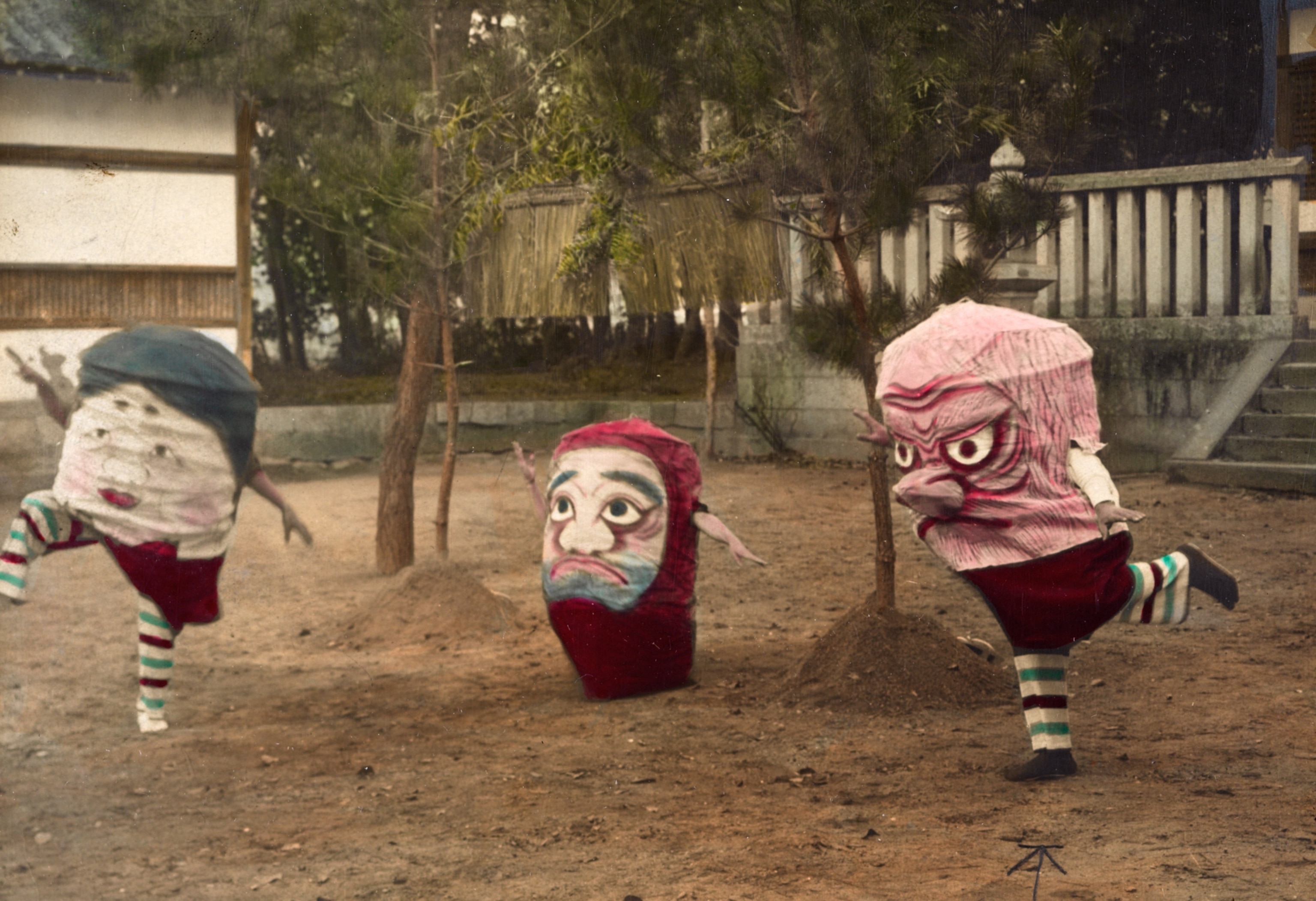 Children dance in giant mask-like costumes