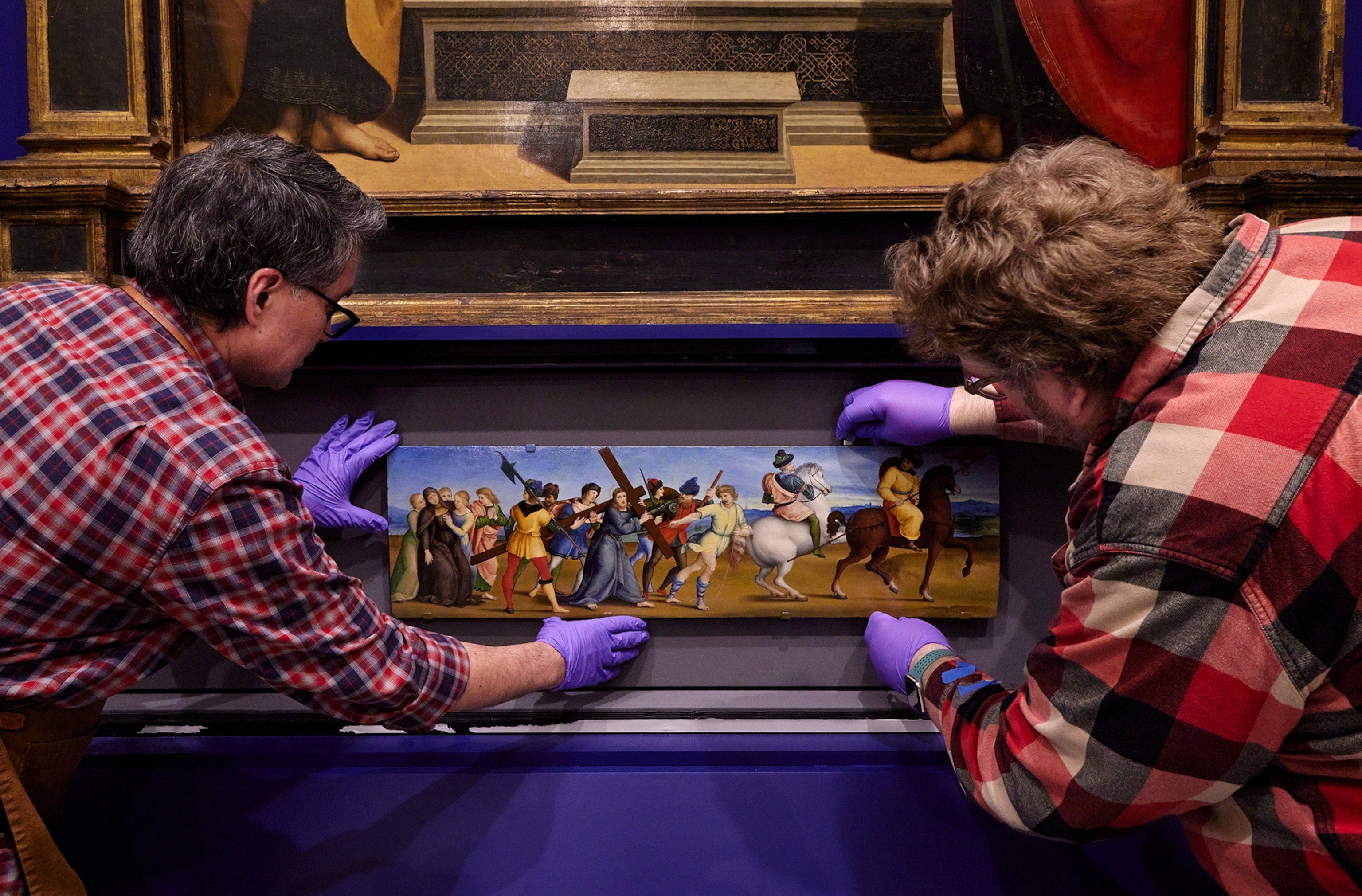 Mathew Cumbie (right) and Alan Miller (left) in front of the Colonna Altarpiece at The Metropolitan Museum of Art on March 5, 2026.