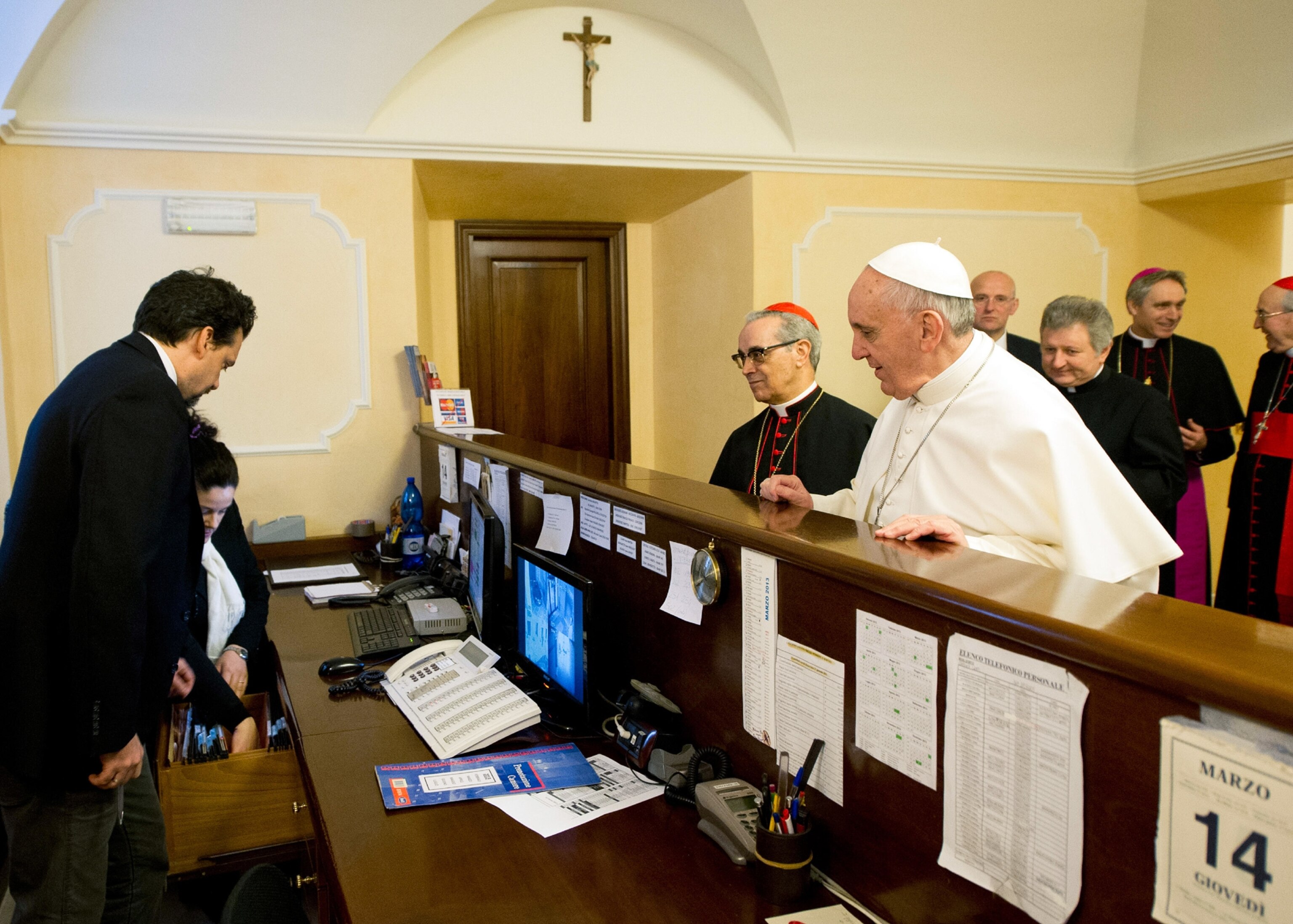 Pope Francis paying his hotel bill in Rome, Italy.