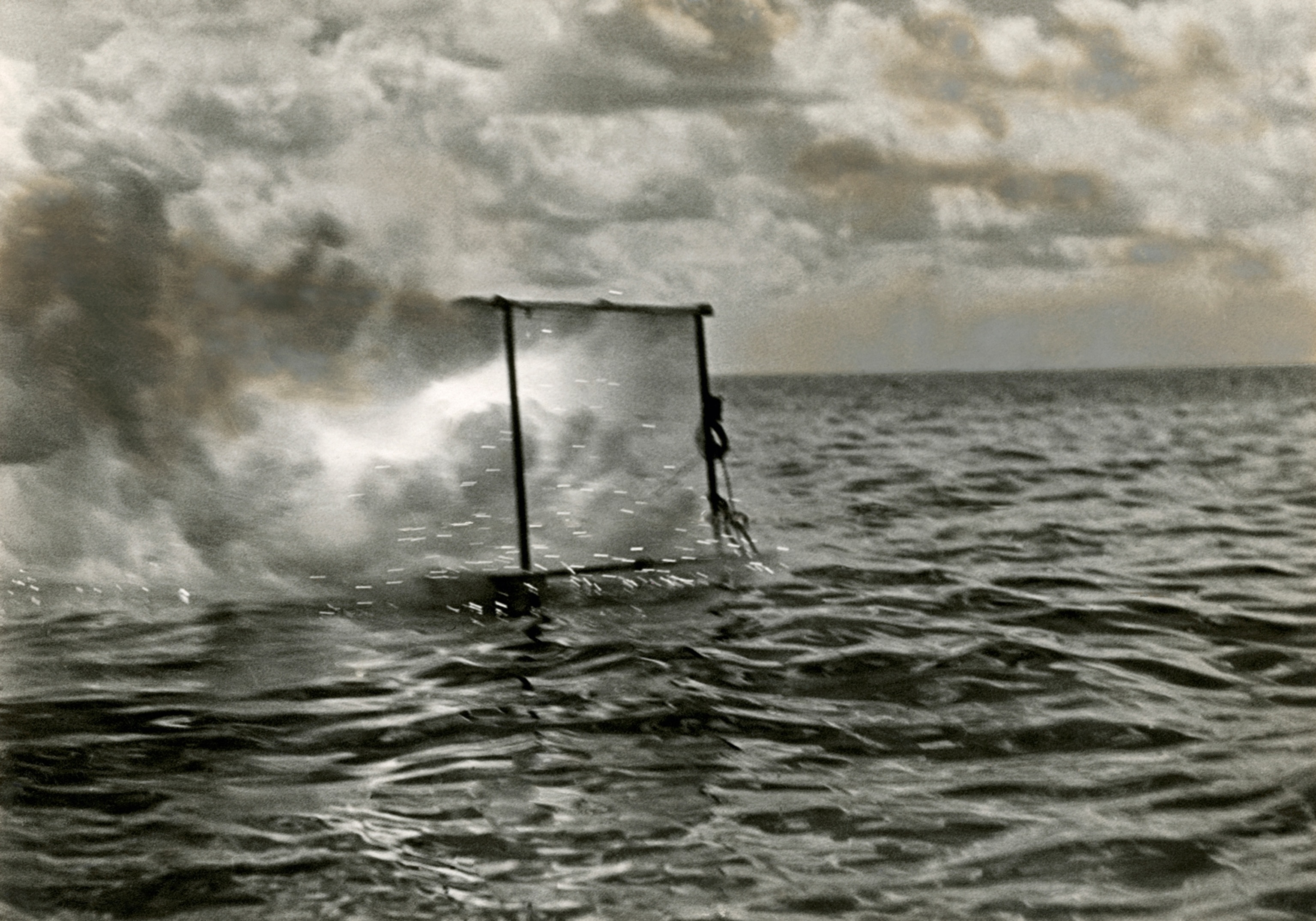 Magnesium powder explosives make light for the first underwater photo.