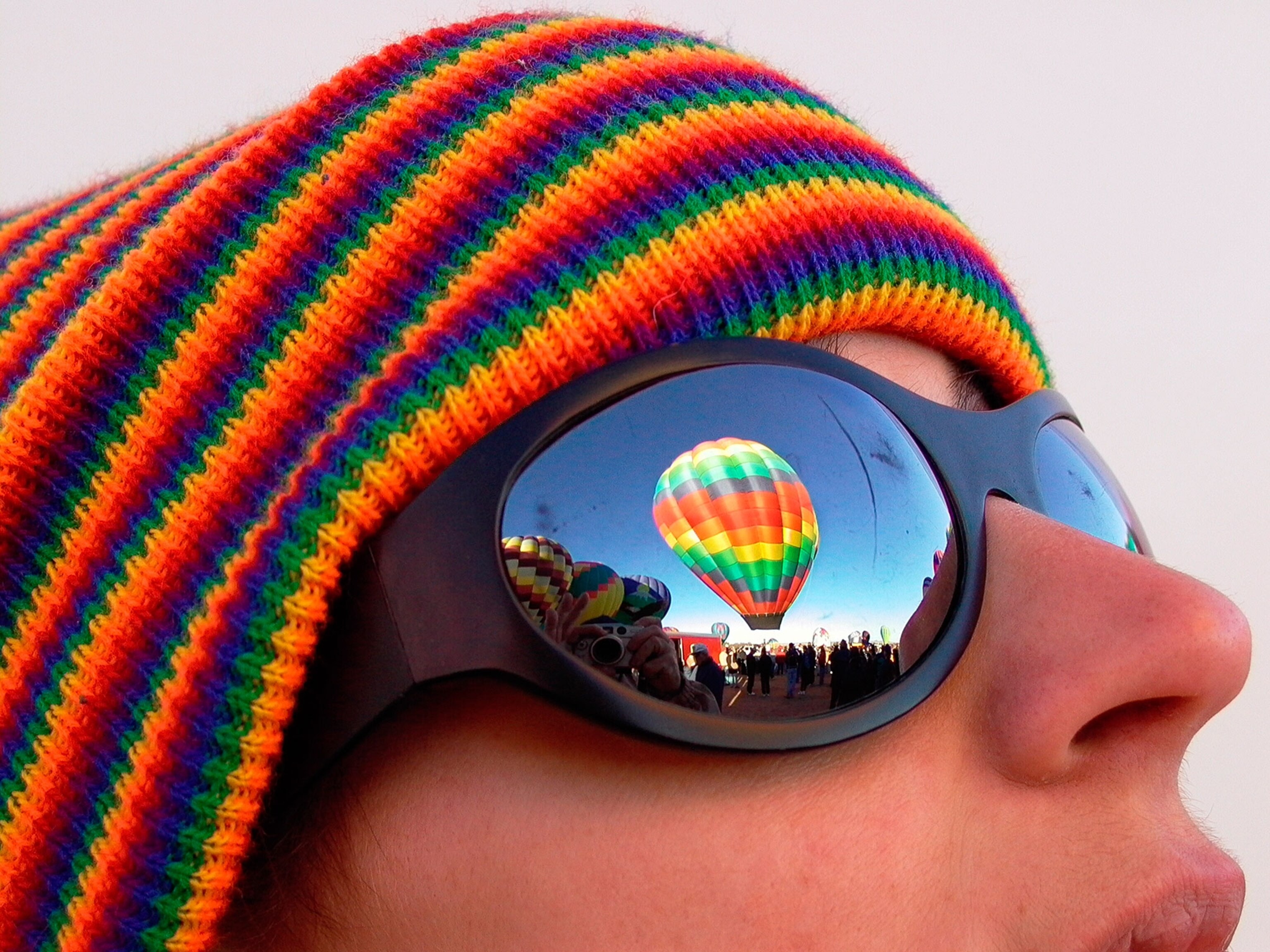 hot air balloon reflecting in sunglasses