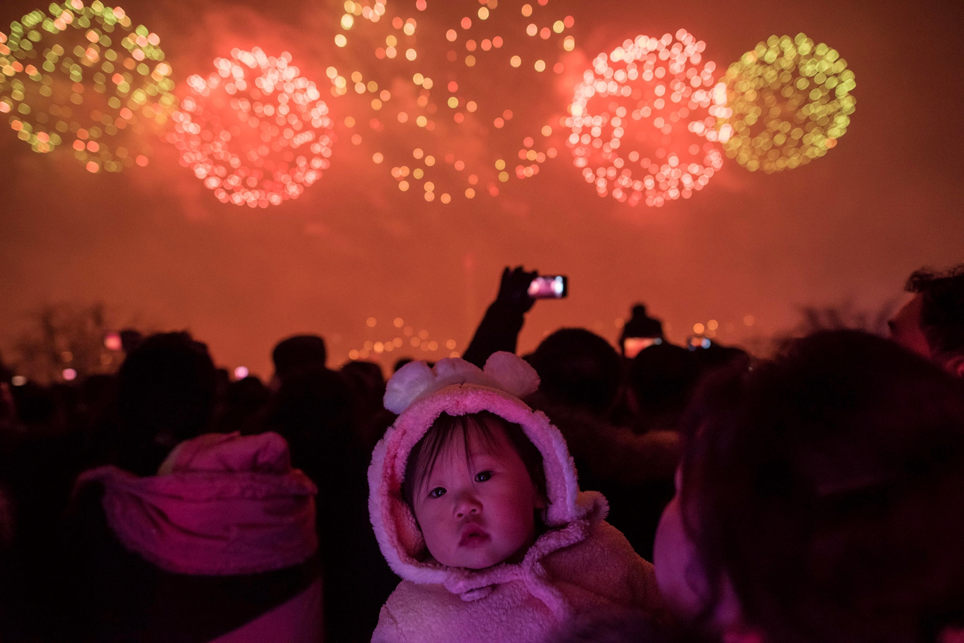 a child watching a fireworks display in North Korea