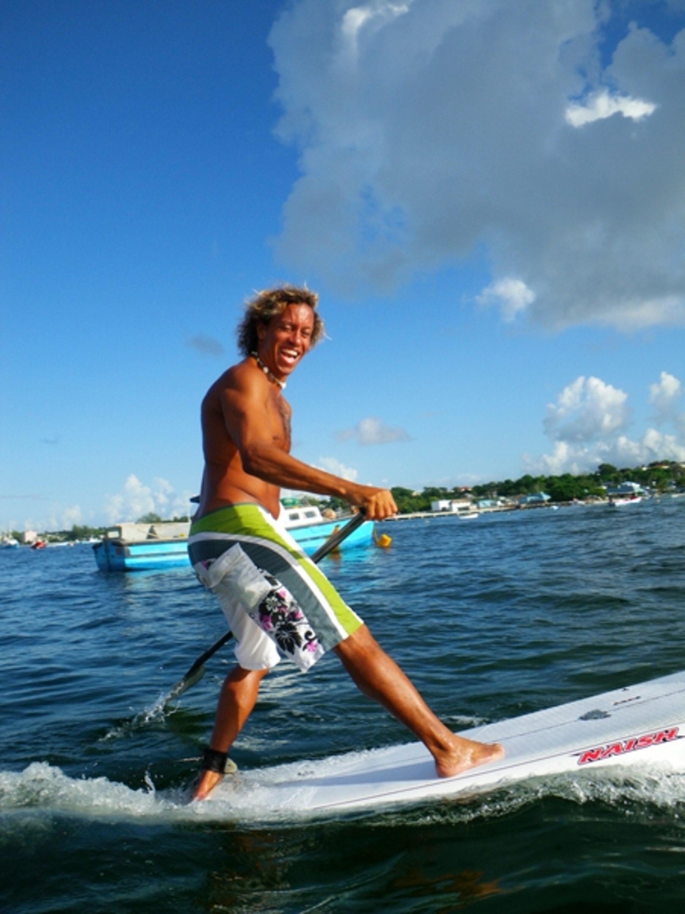 man paddle surfboard Barbados