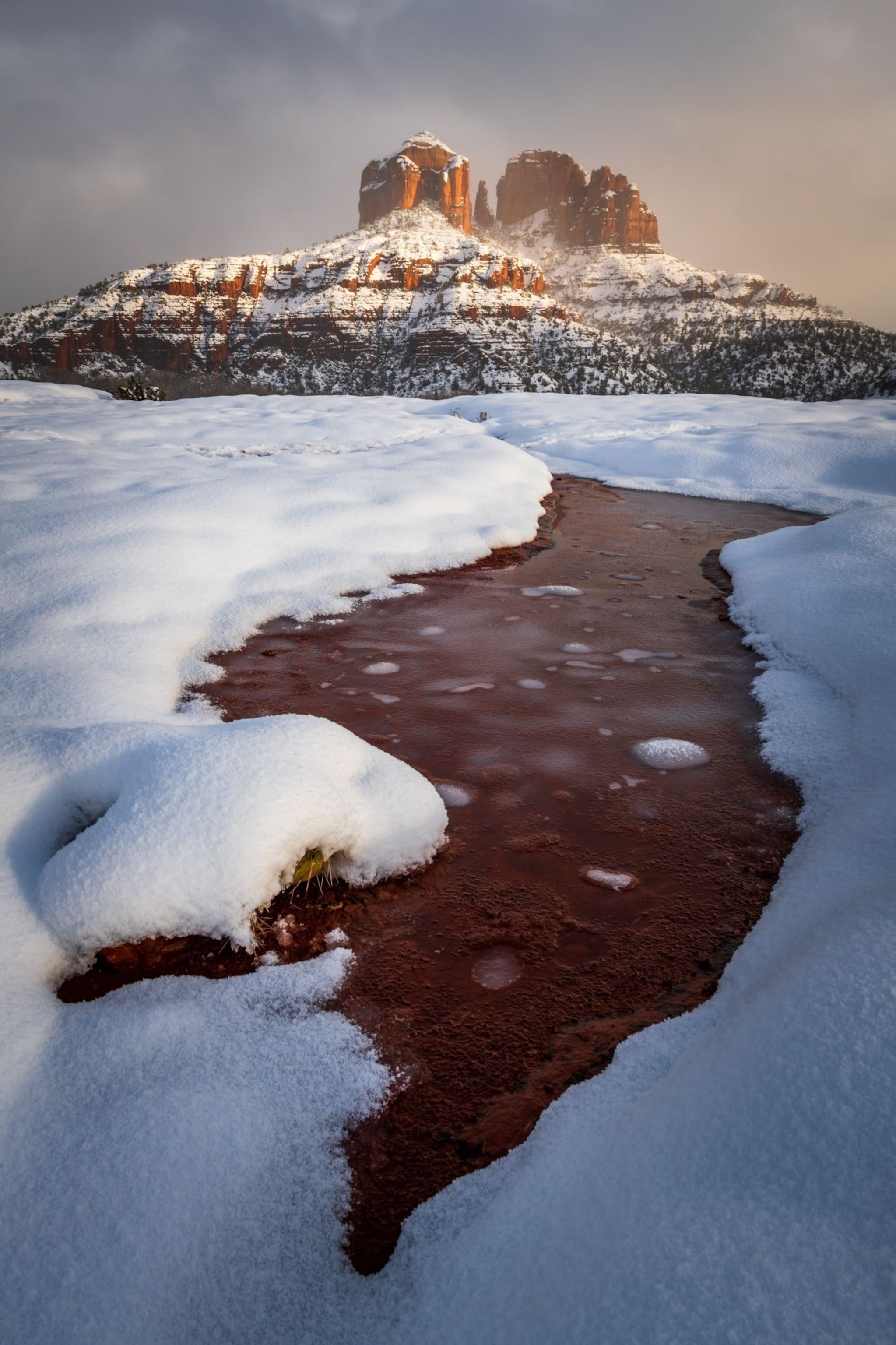 a snowy landscape near Cathedral Rock in Sedona, Arizona