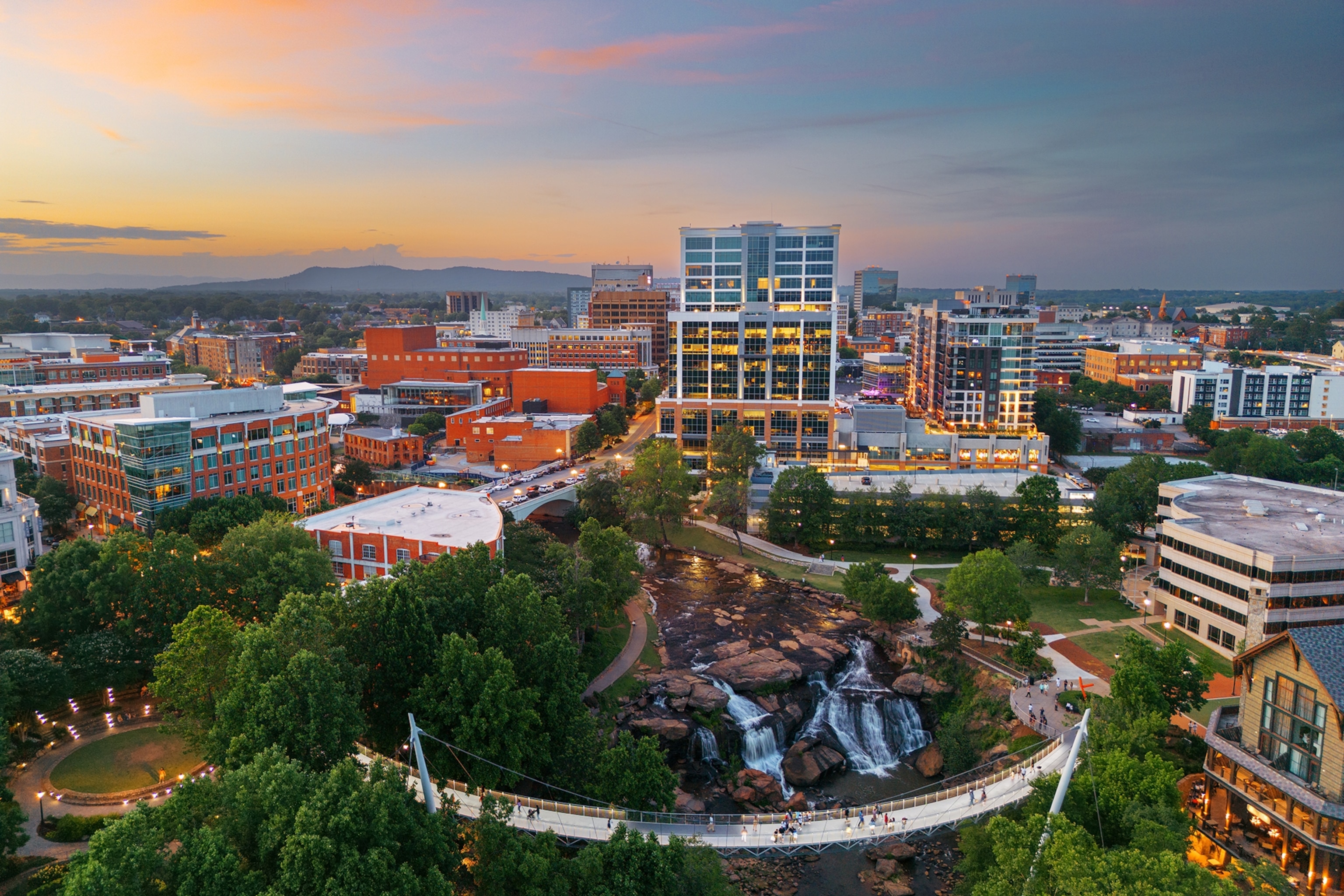 Greenville, South Carolina at Falls Park on Reedy Creek at dusk.