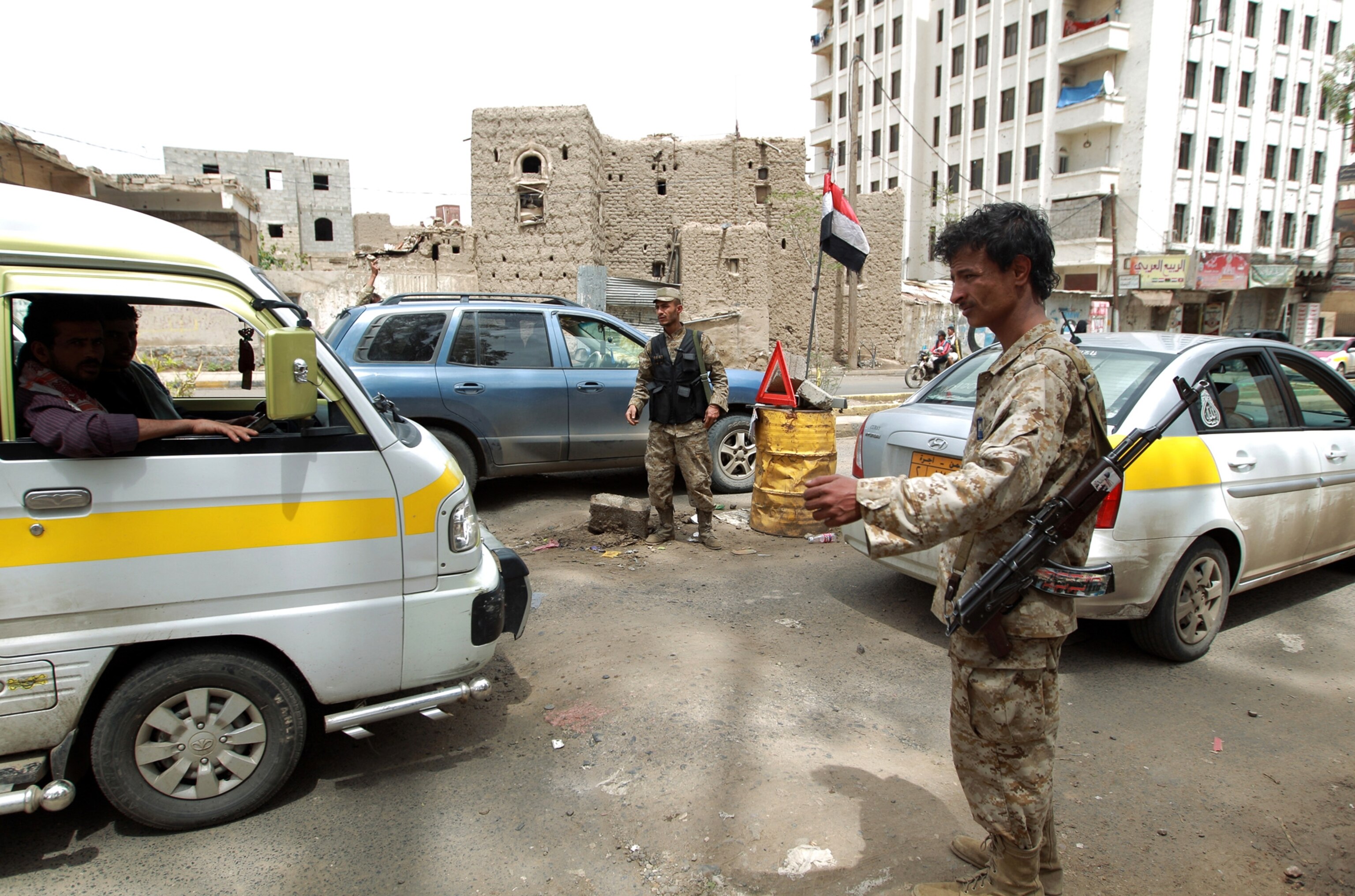 Yemeni police man a checkpoint in Saana.