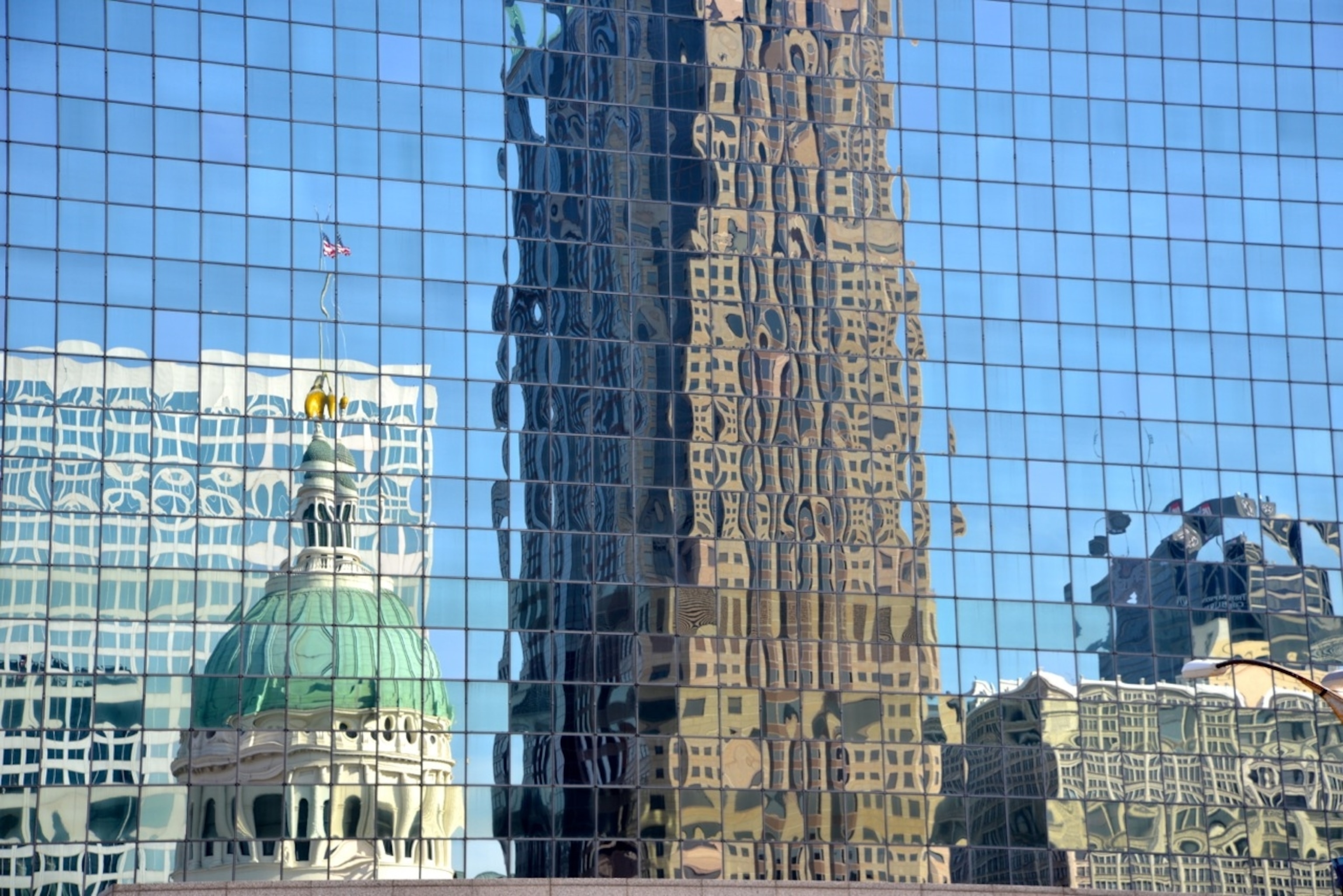 The city of St. Louis, reflected in the glossy high rises near the Mississippi River. (Photo by Andrew Evans, National Geographic Travel)