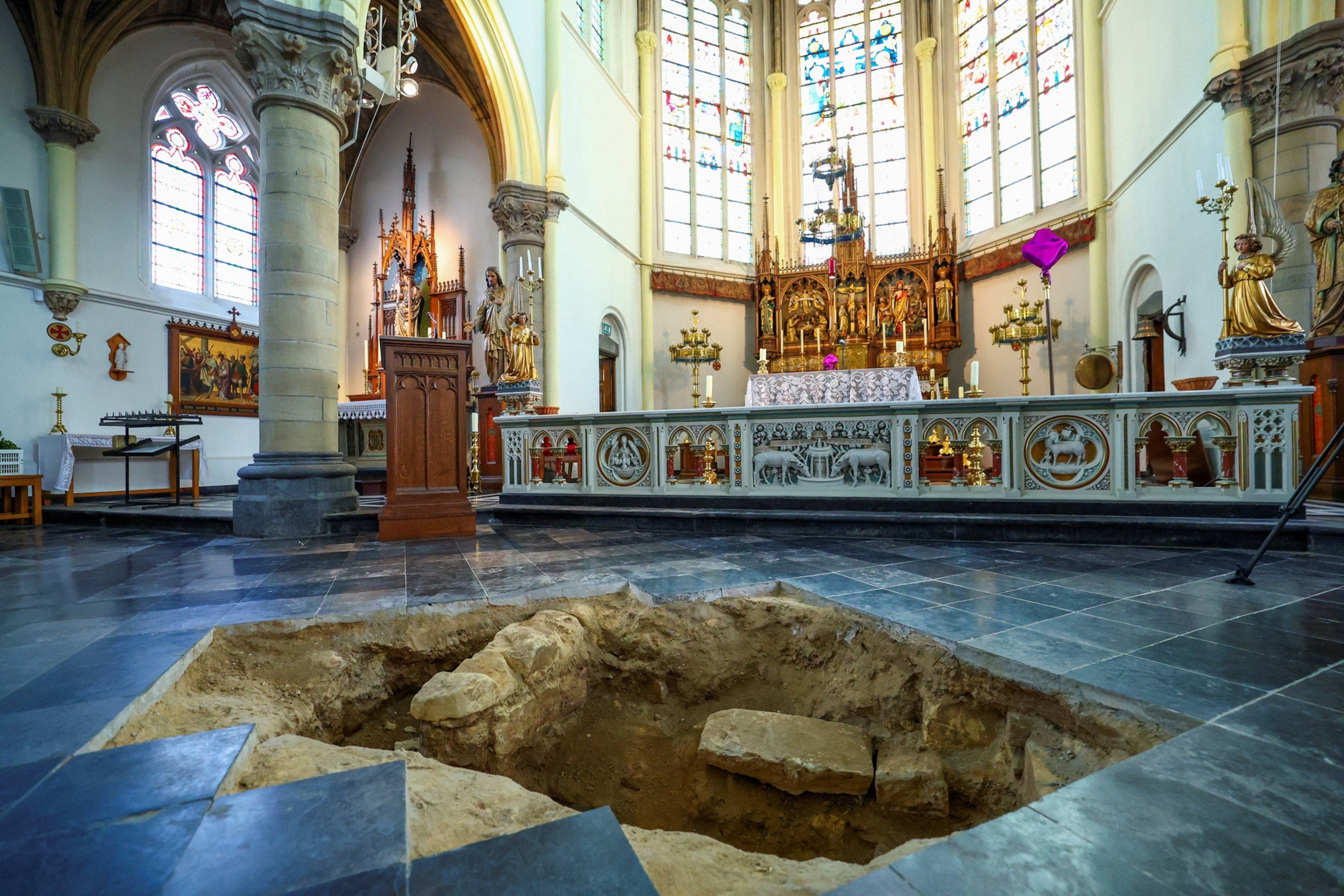 The inside of a church with a hole in the floor