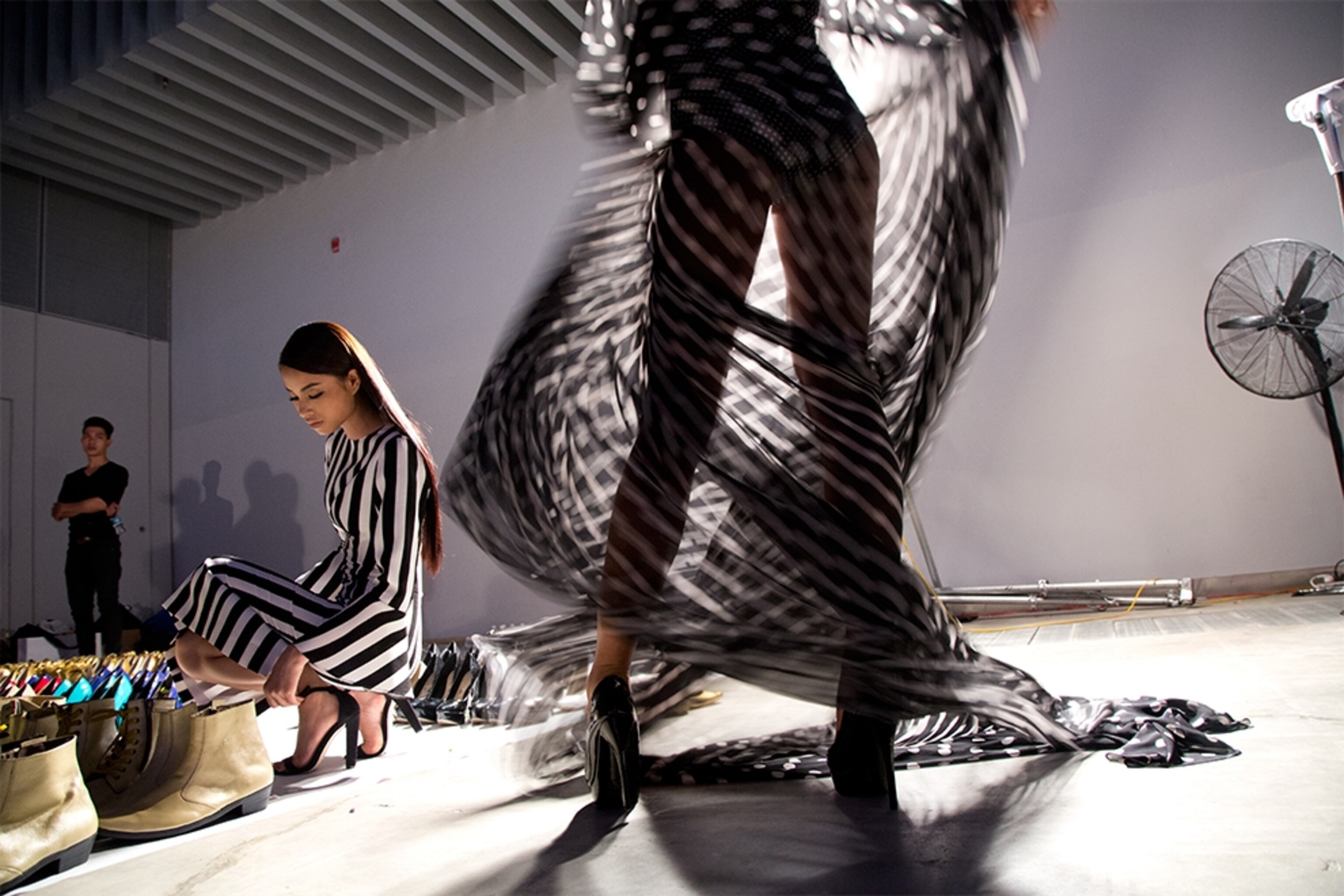 a backstage at a fashion show by designer Do Manh Cuong in Vietnam