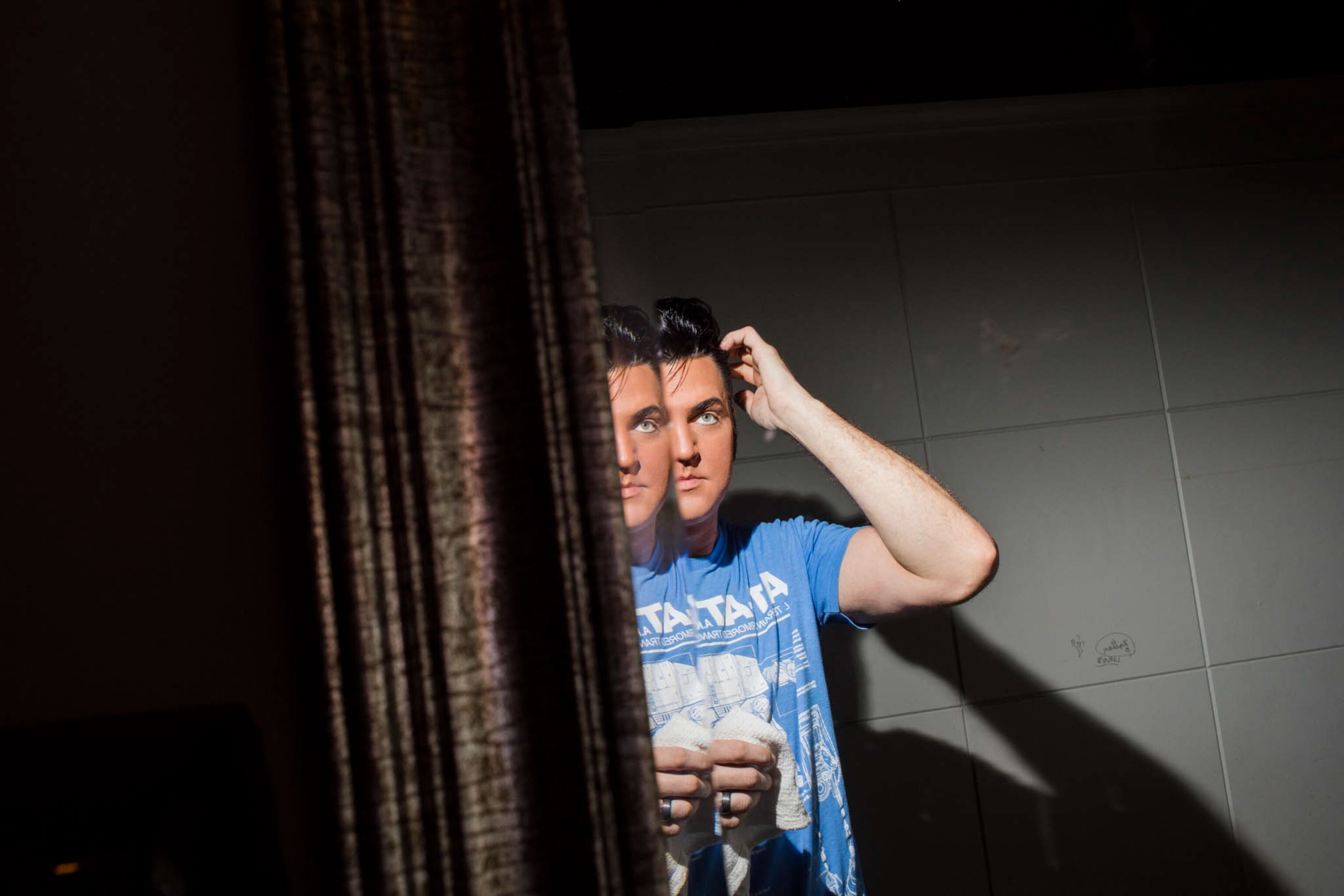 an Elvis tribute artist getting ready