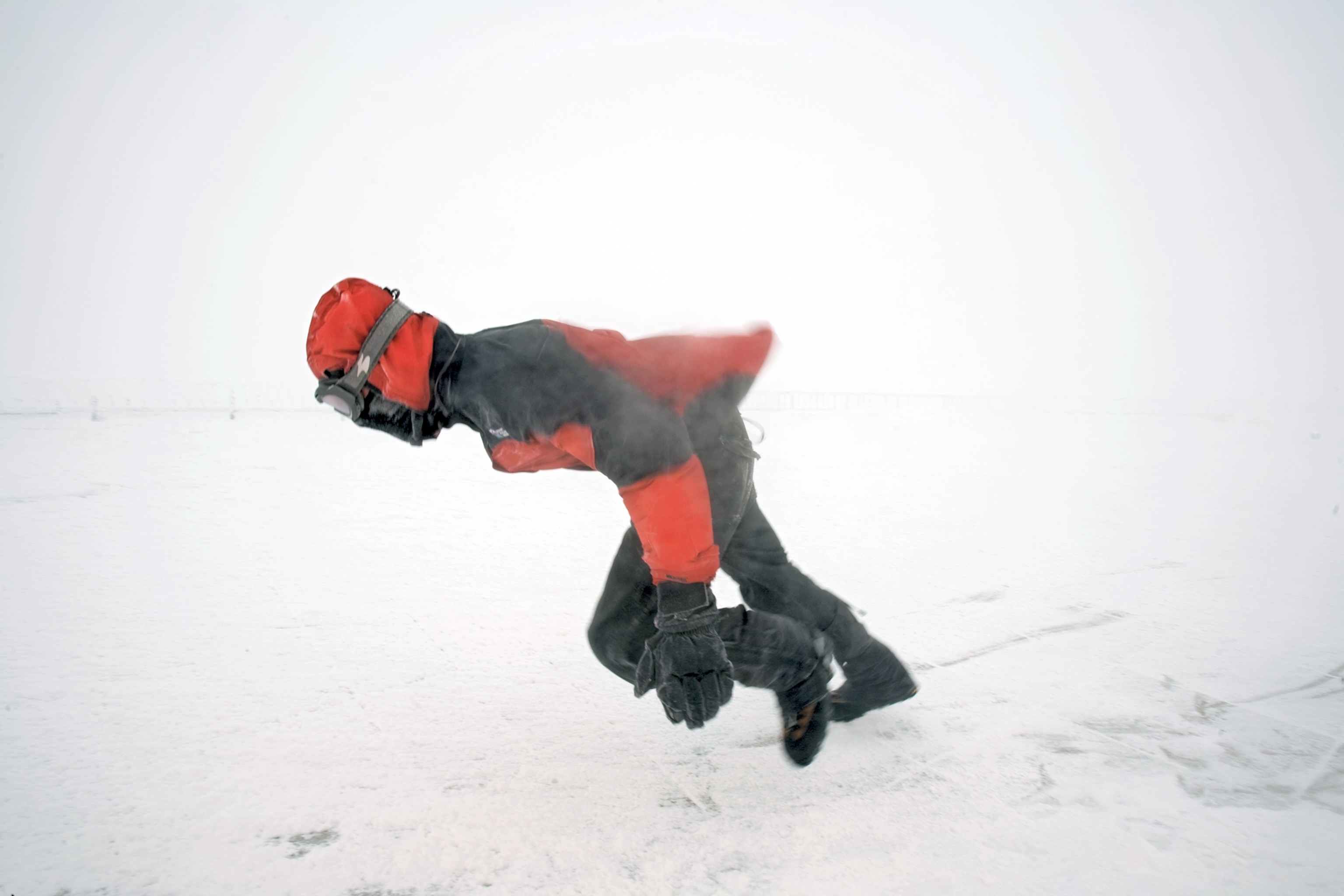 Ryan Buckley bending to the will of a hundred-mile-an-hour gust on Mount Washington