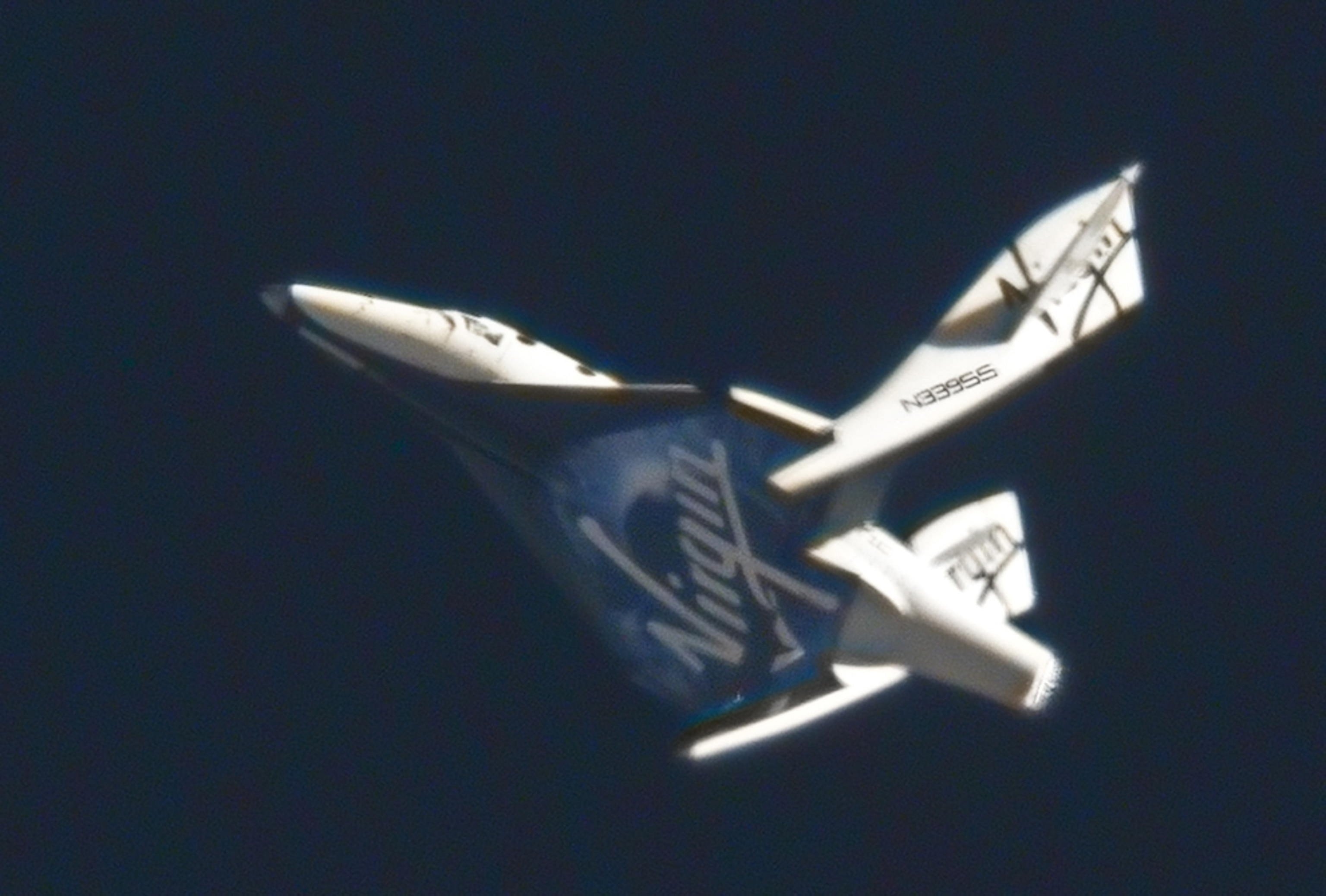 the Virgin Galactic SpaceShipTwo in feathered flight mode
